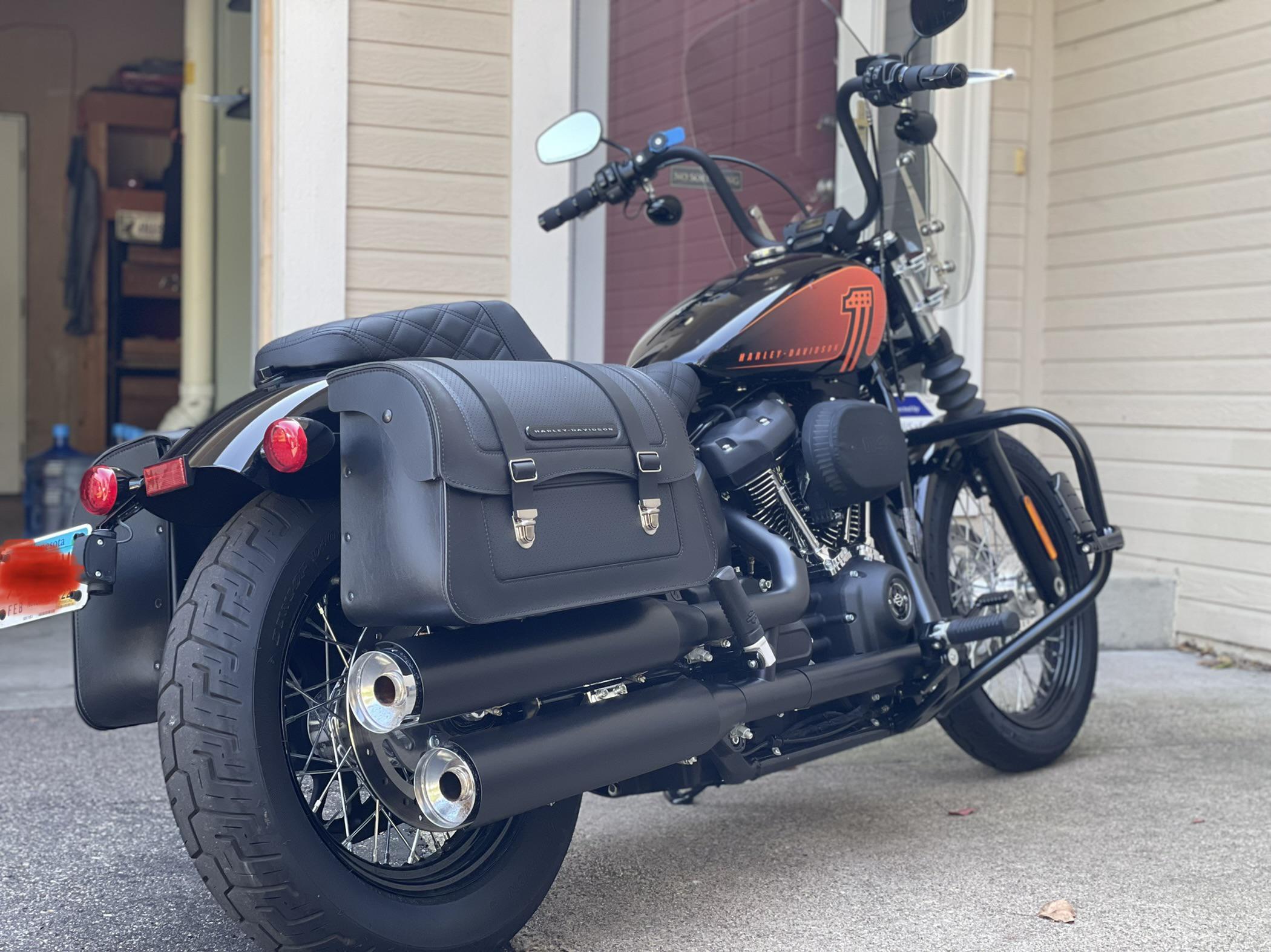 Probably not too many Street Bobs with bags and a standard windscreen. Some may hate it, but not