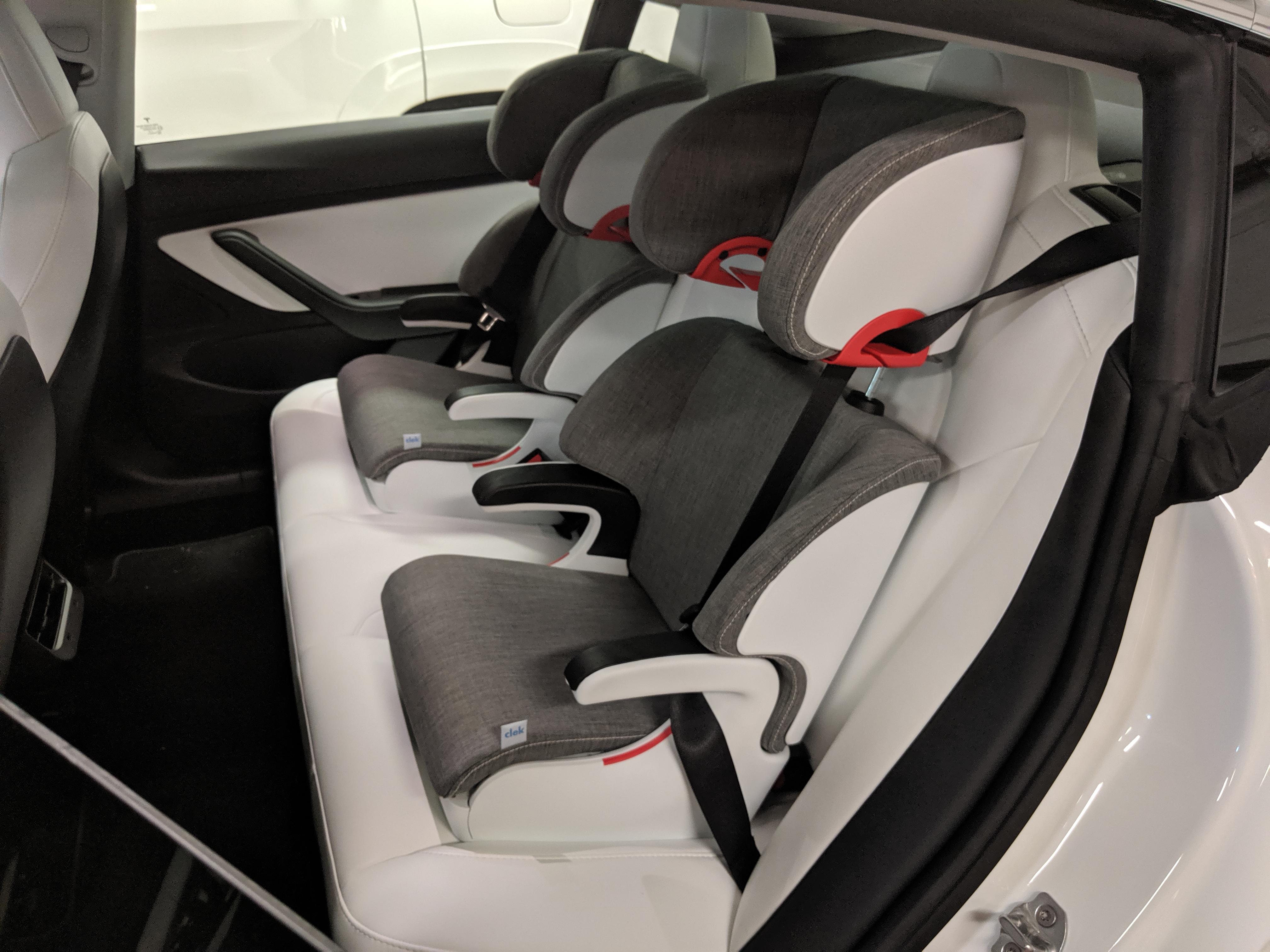 TM3 White with white interior child seats TeslaModel3