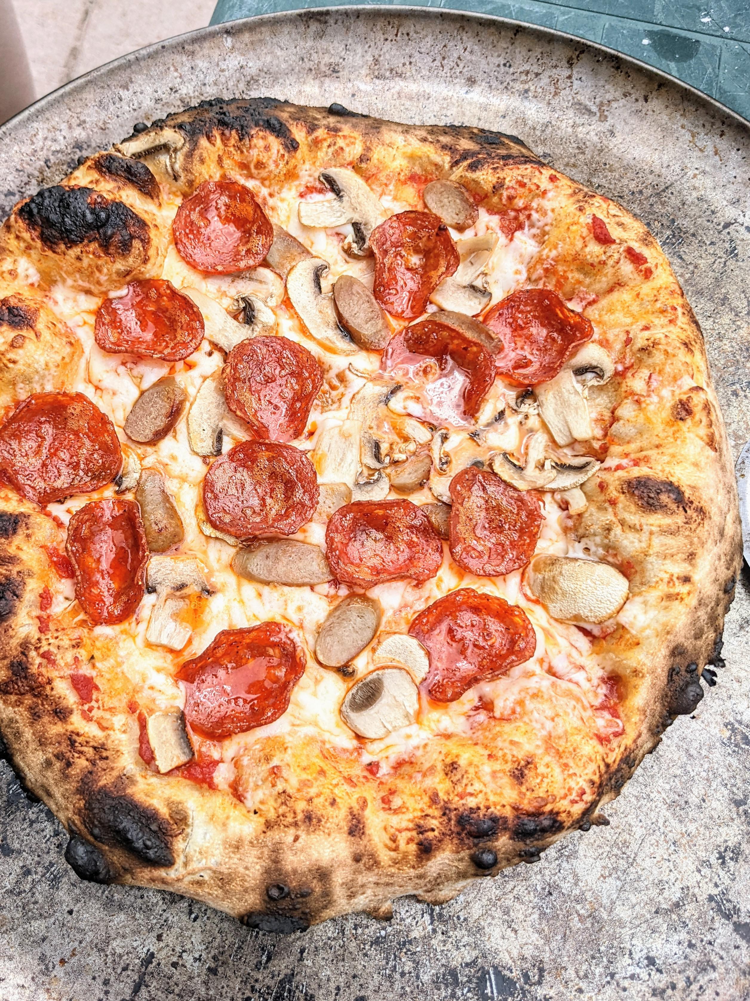 Pepperoni, sausage, mushroom pizza r/FoodPorn