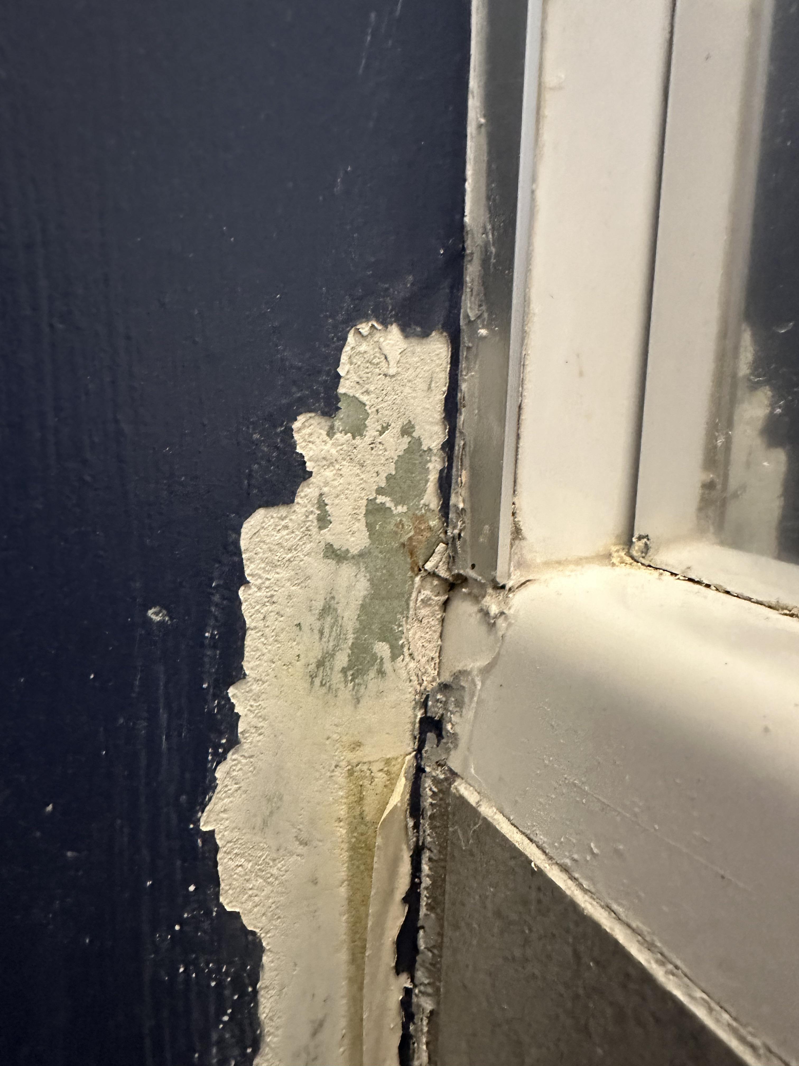 Bathtub wall joint seems to have caused some issues with the surrounding paint. Thoughts on how