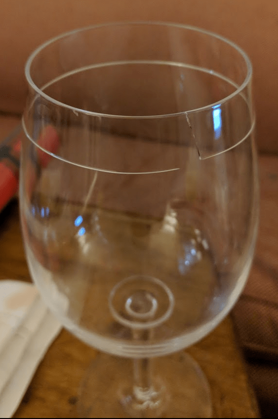 My wine glass cracked almost all the way around. r/mildlyinteresting