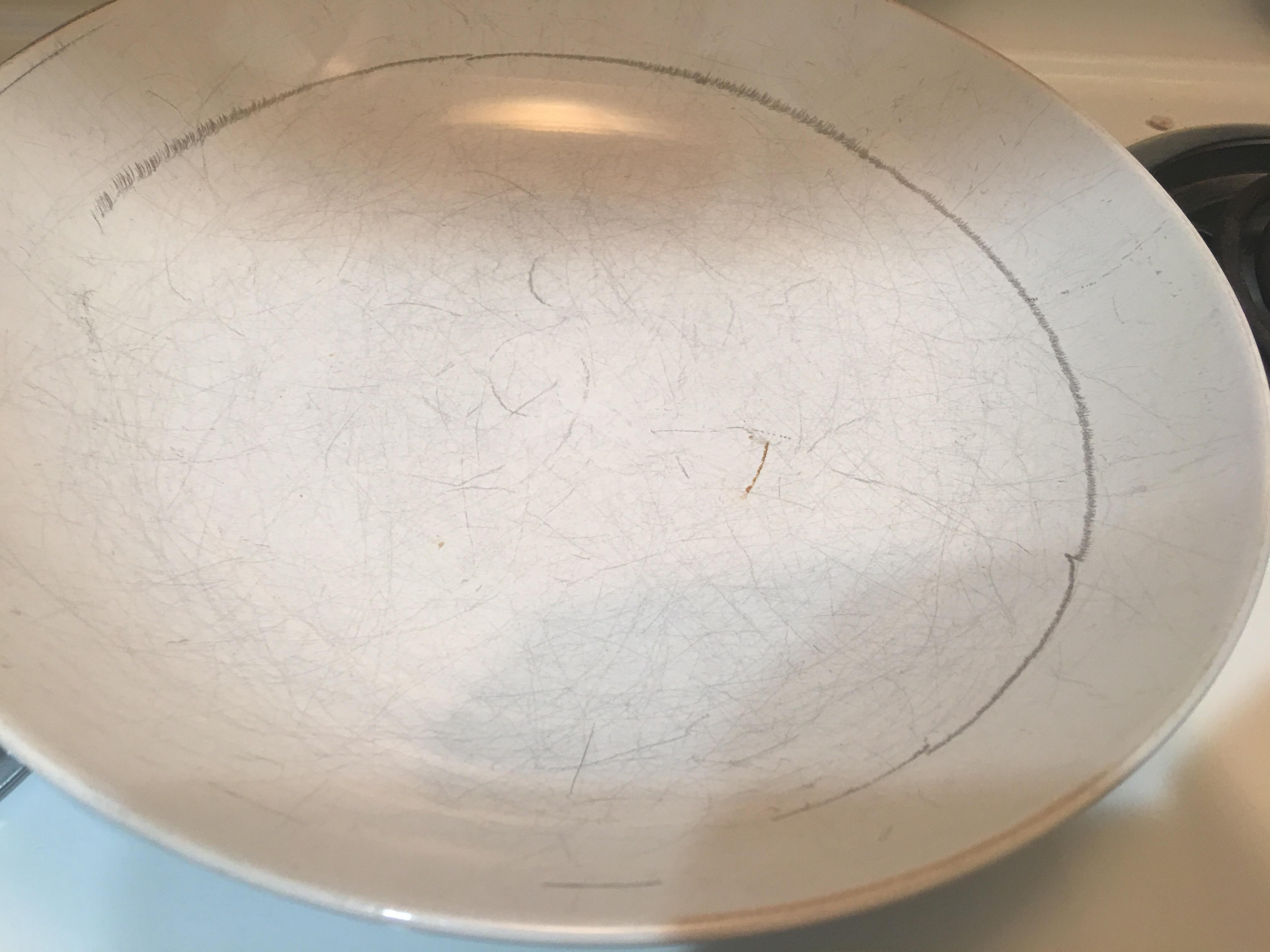 Some dishes coming out of my dishwasher have a black circle inside of