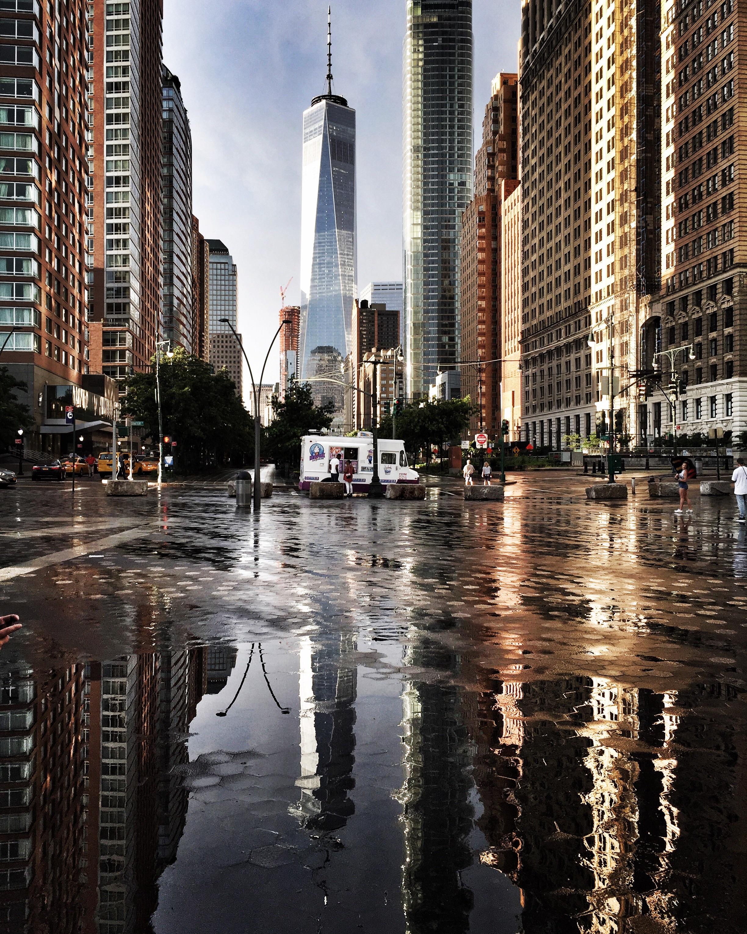Snapped this picture of the Freedom Tower in NYC after a rain shower