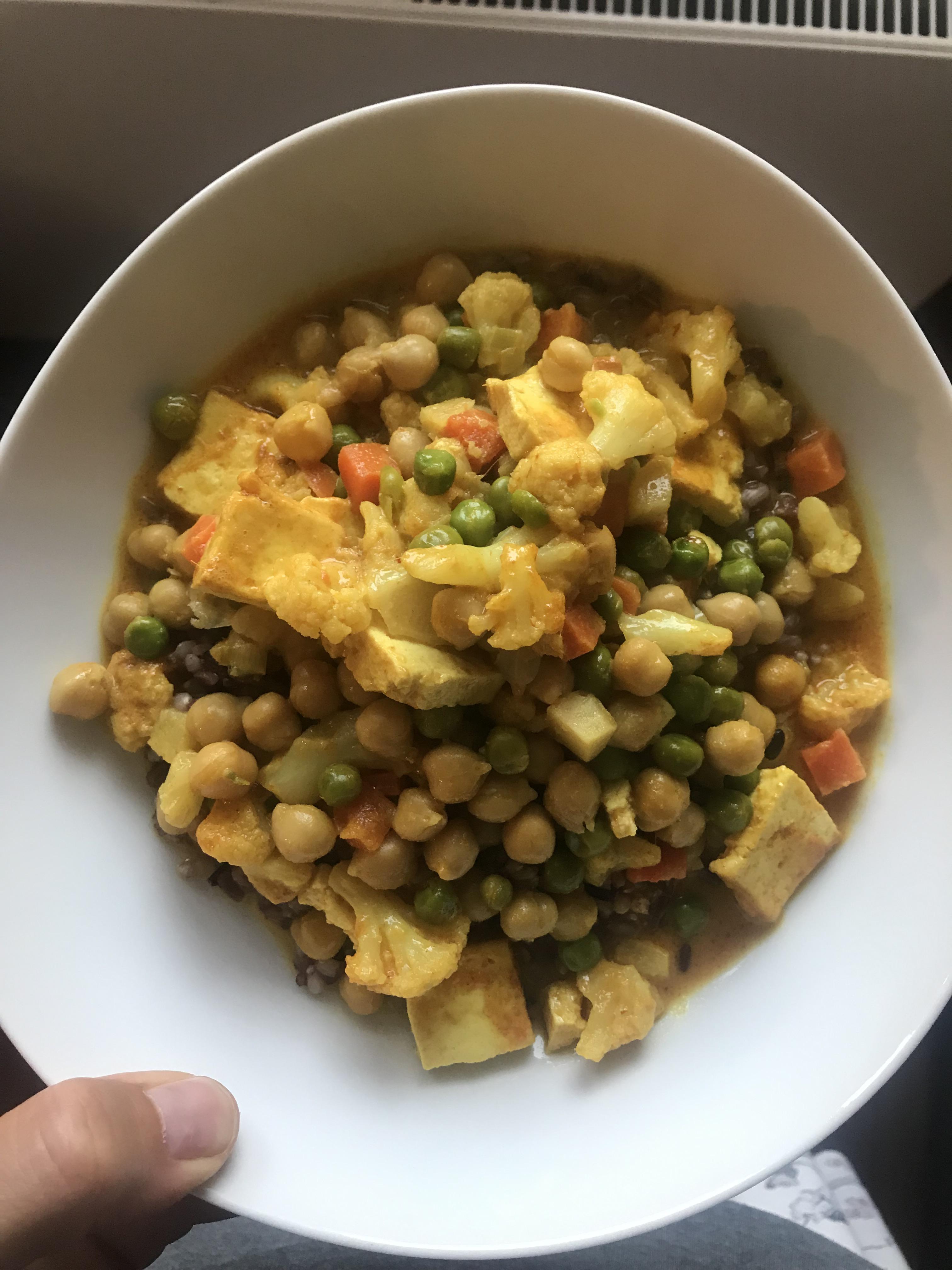 VeggieTofuchickpea coconut milk curry with brown rice and a lots of