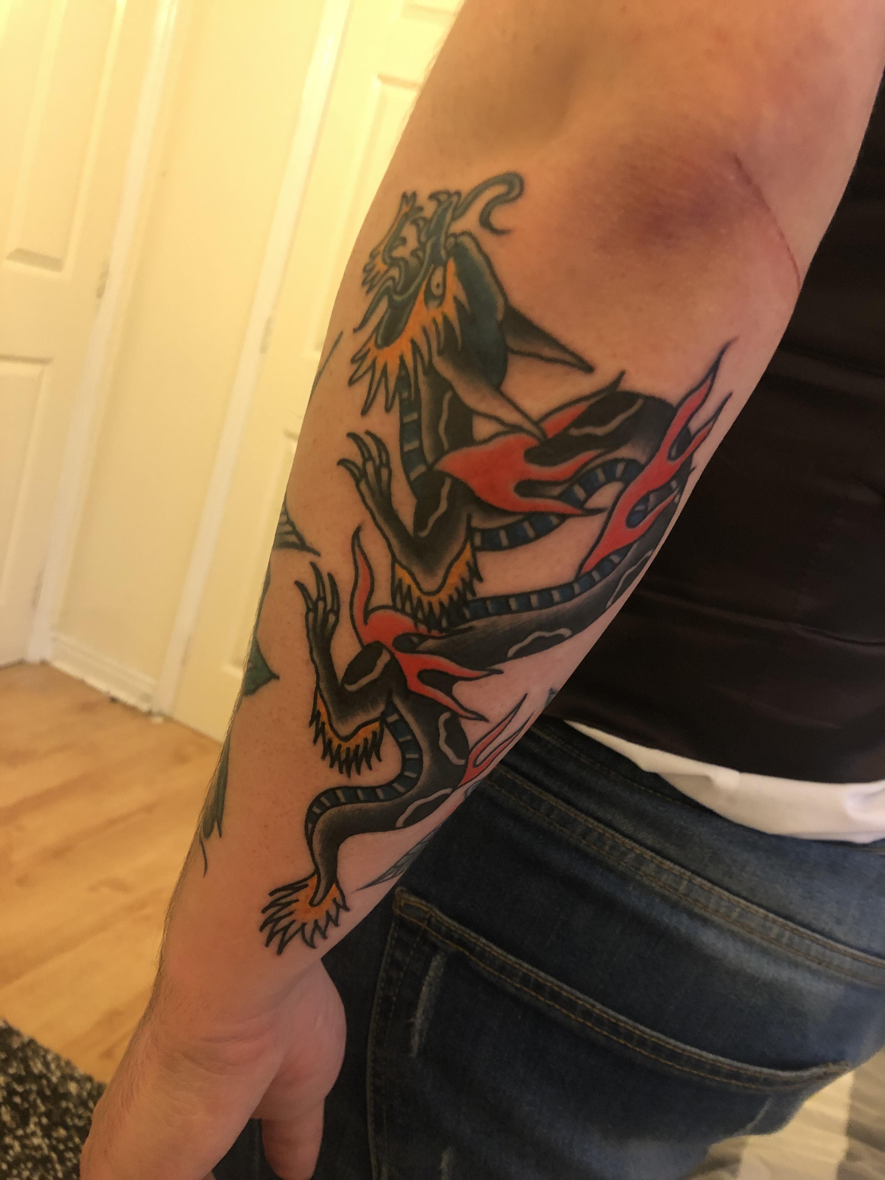 My Scaly boi healed done by Dom at spider tattoos harrow