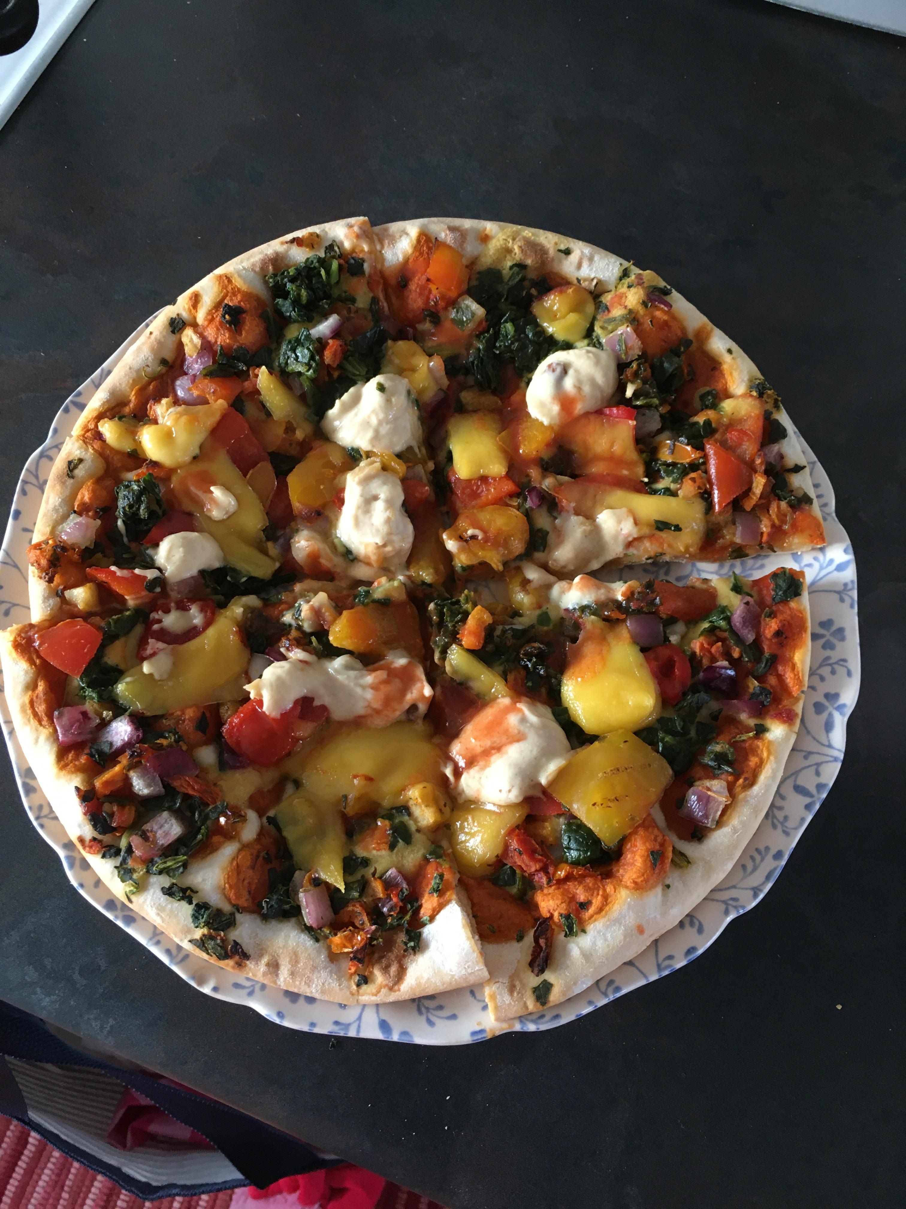 Asda roasted veg pizza, I added applewood smoked vegan cheddar, hummus and hot sauce r