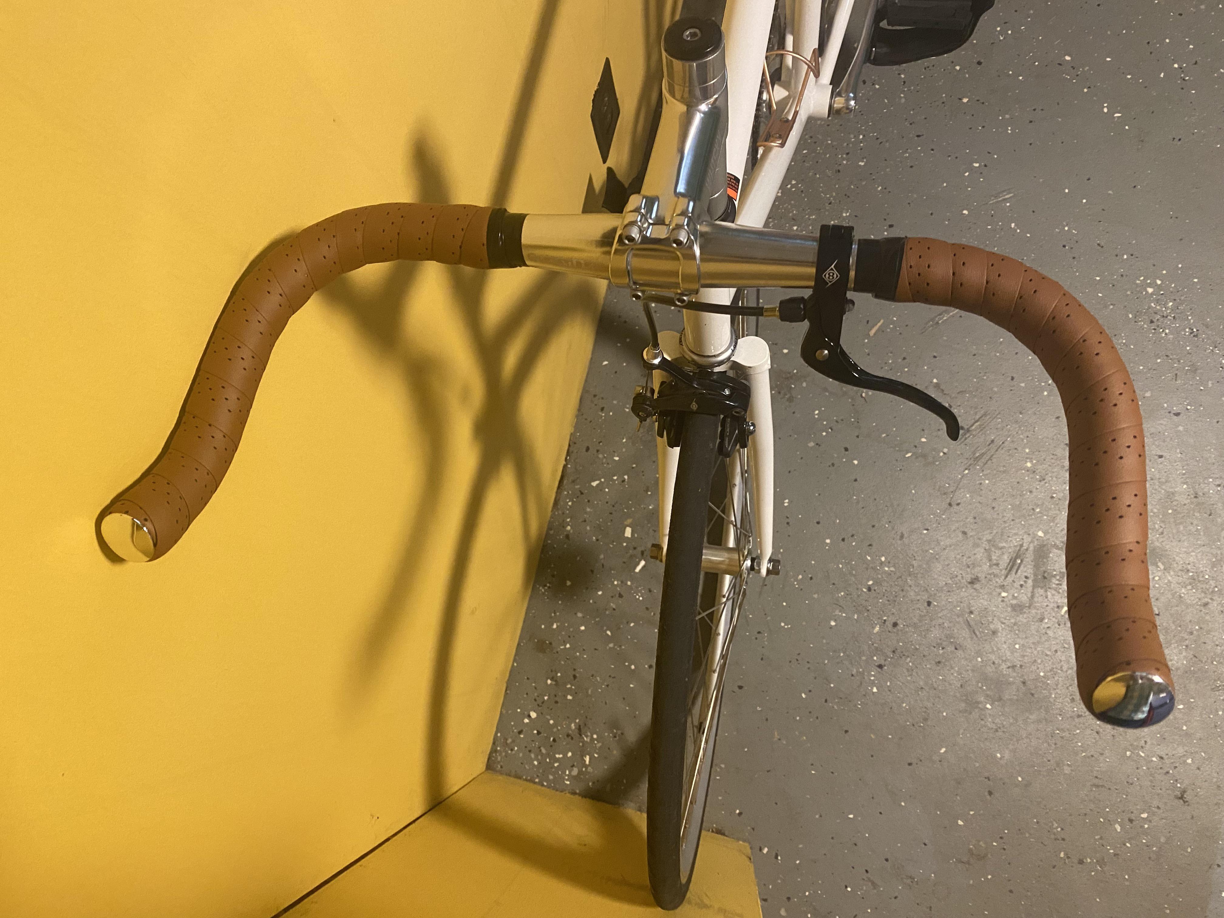 Built my first fixed gear. How to move brake lever inward? Bar is tapered 31.8mm at stem, but