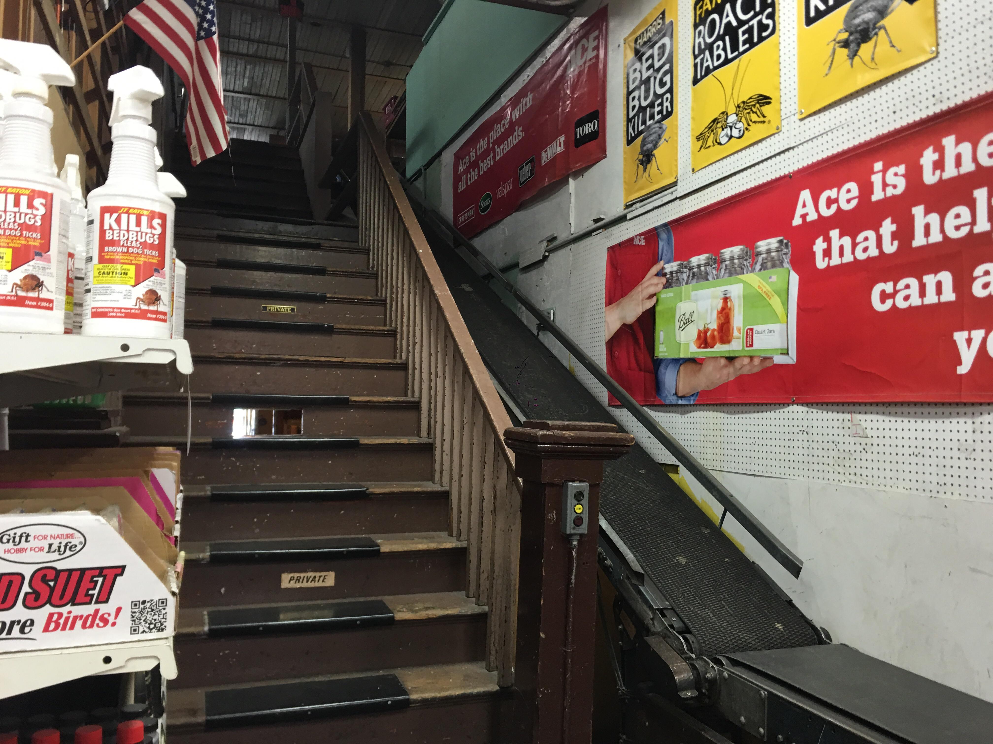 At a old ace hardware, a conveyor leading upstairs. r/mildlyinteresting