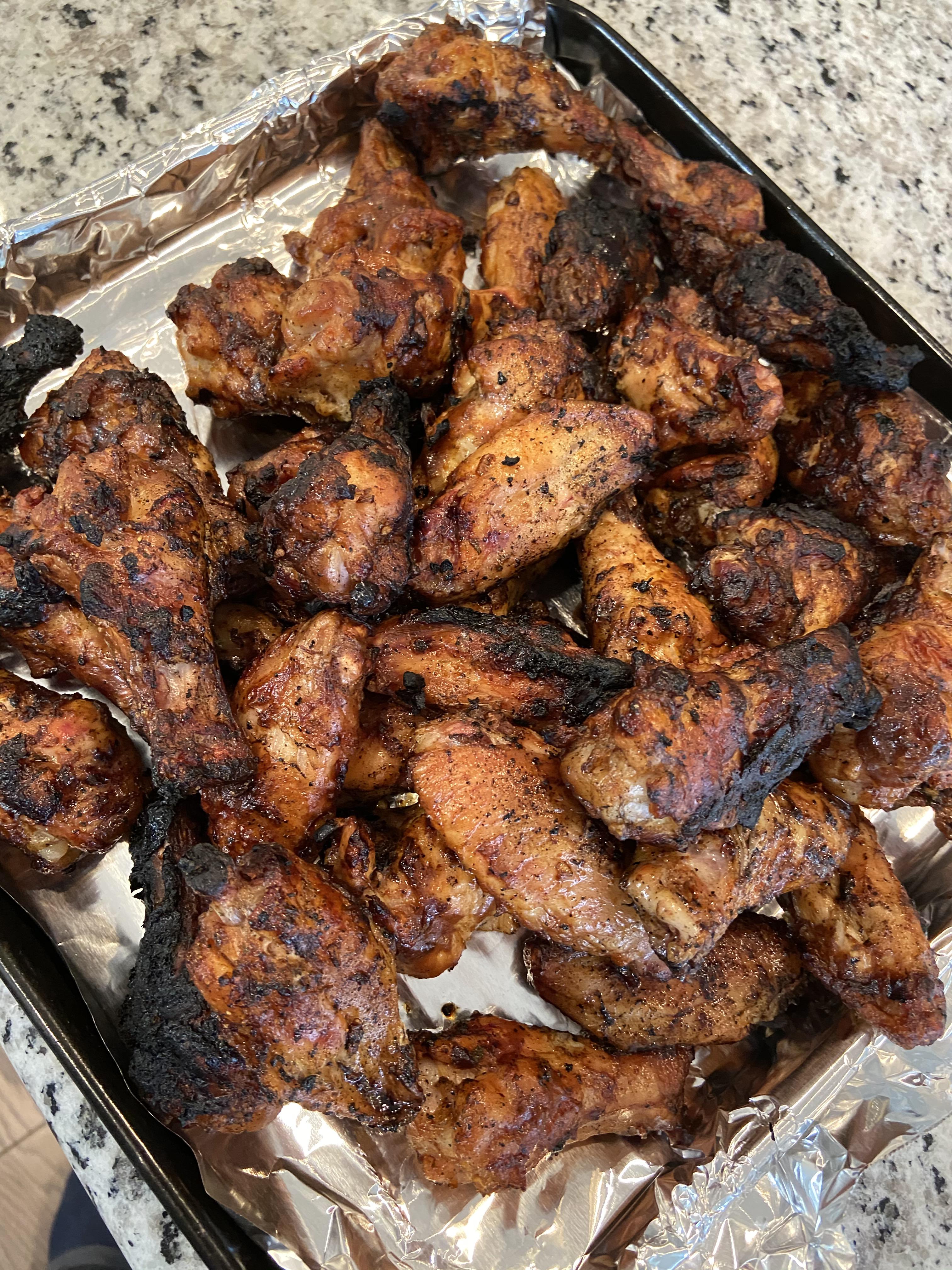 5 lbs of Smoked wings. Taco seasoning. 30min at 225, brushed w bbq