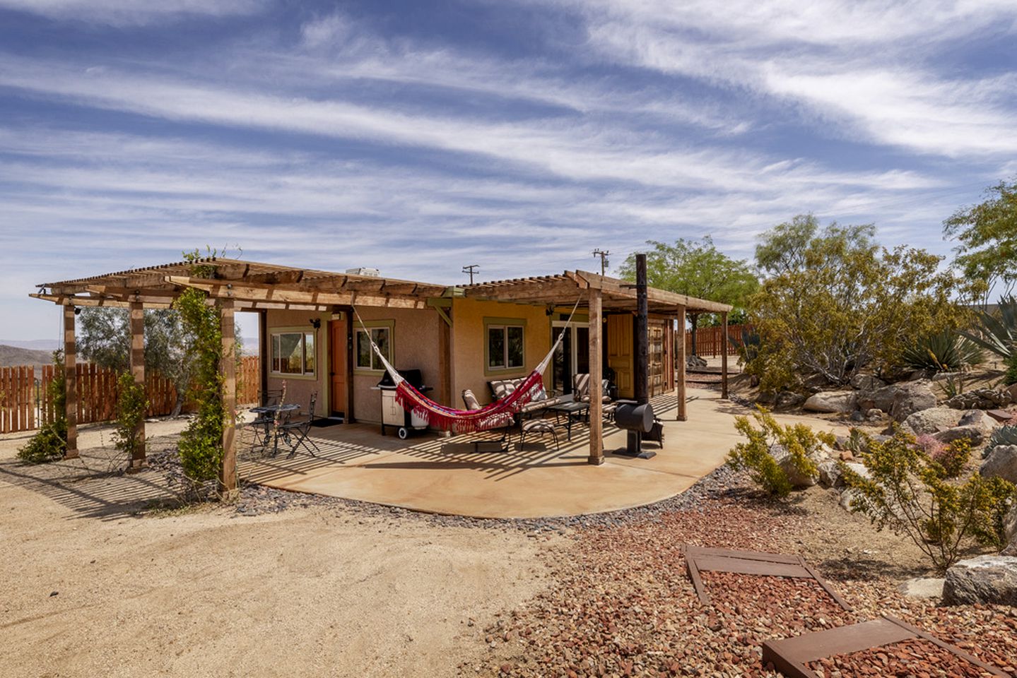 Rancher style desert cabin with a hammock, bbq and shaded overhangs r
