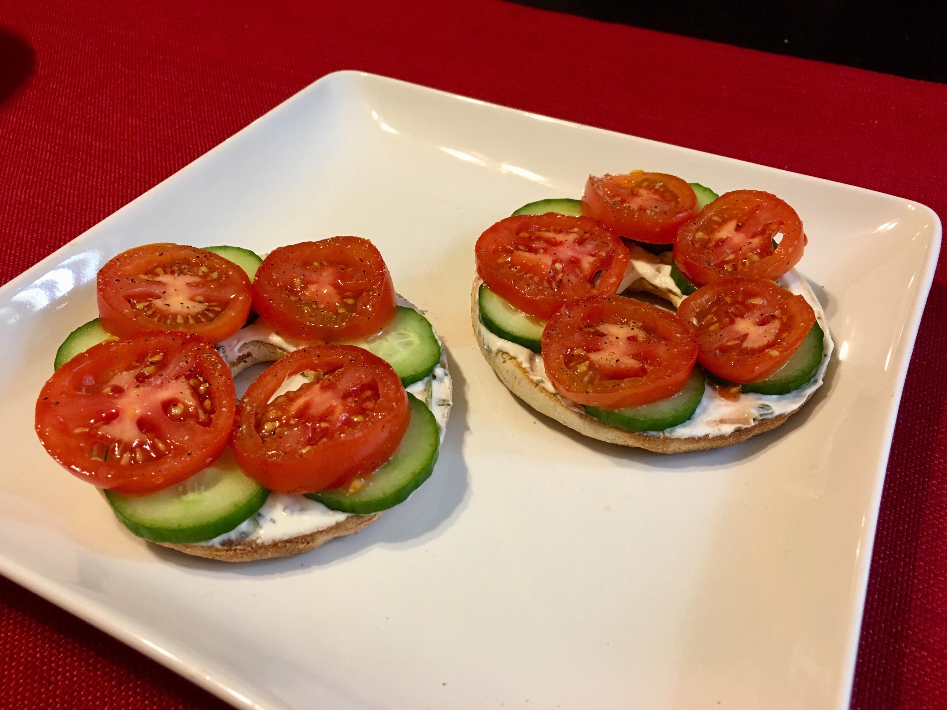 Bagel with cucumber, tomato, and cilantro chive yogurt spread 190 calories! r/1200isplenty