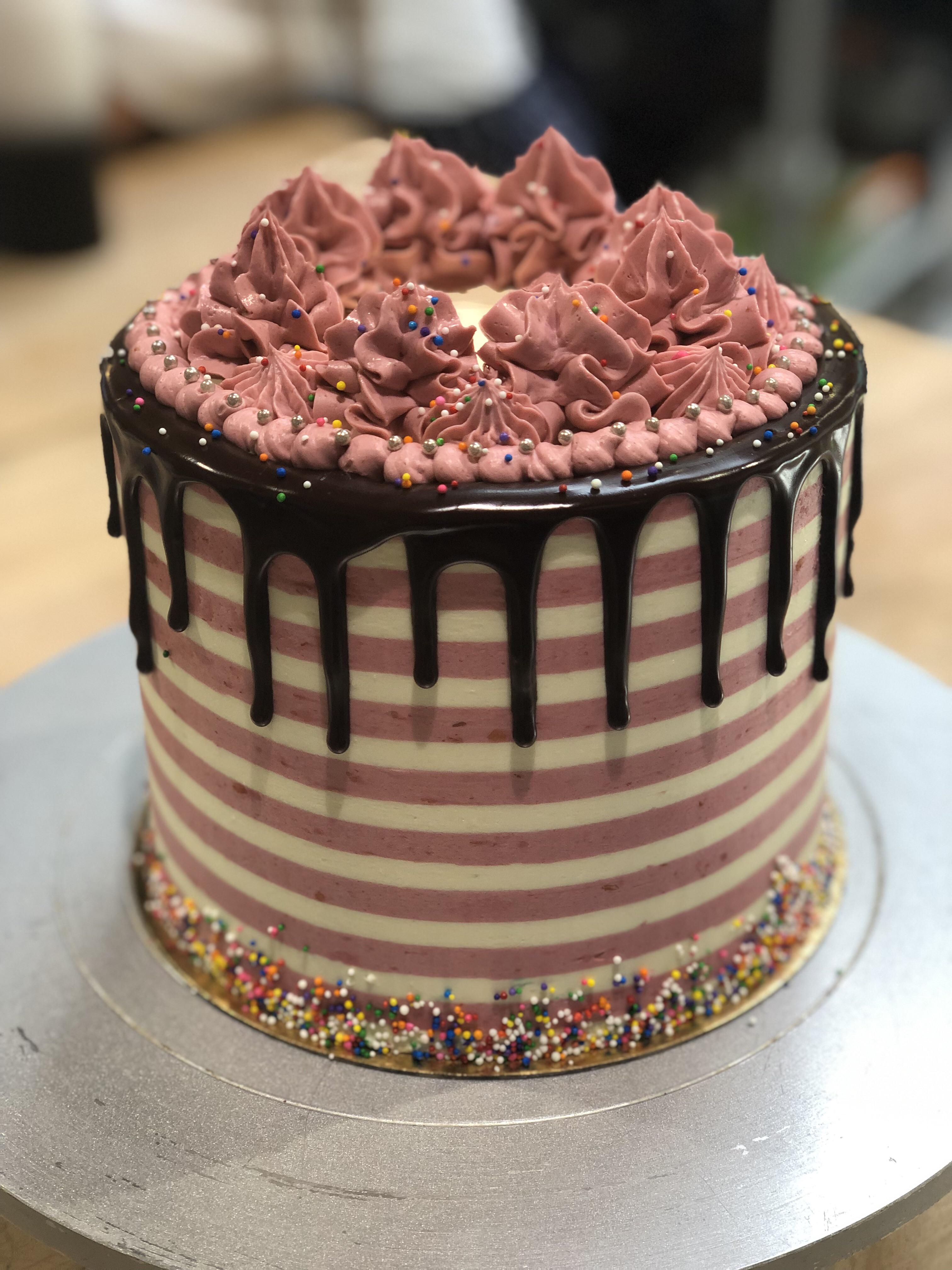 [homemade] chocolate cake with sour cherry buttercream r/food