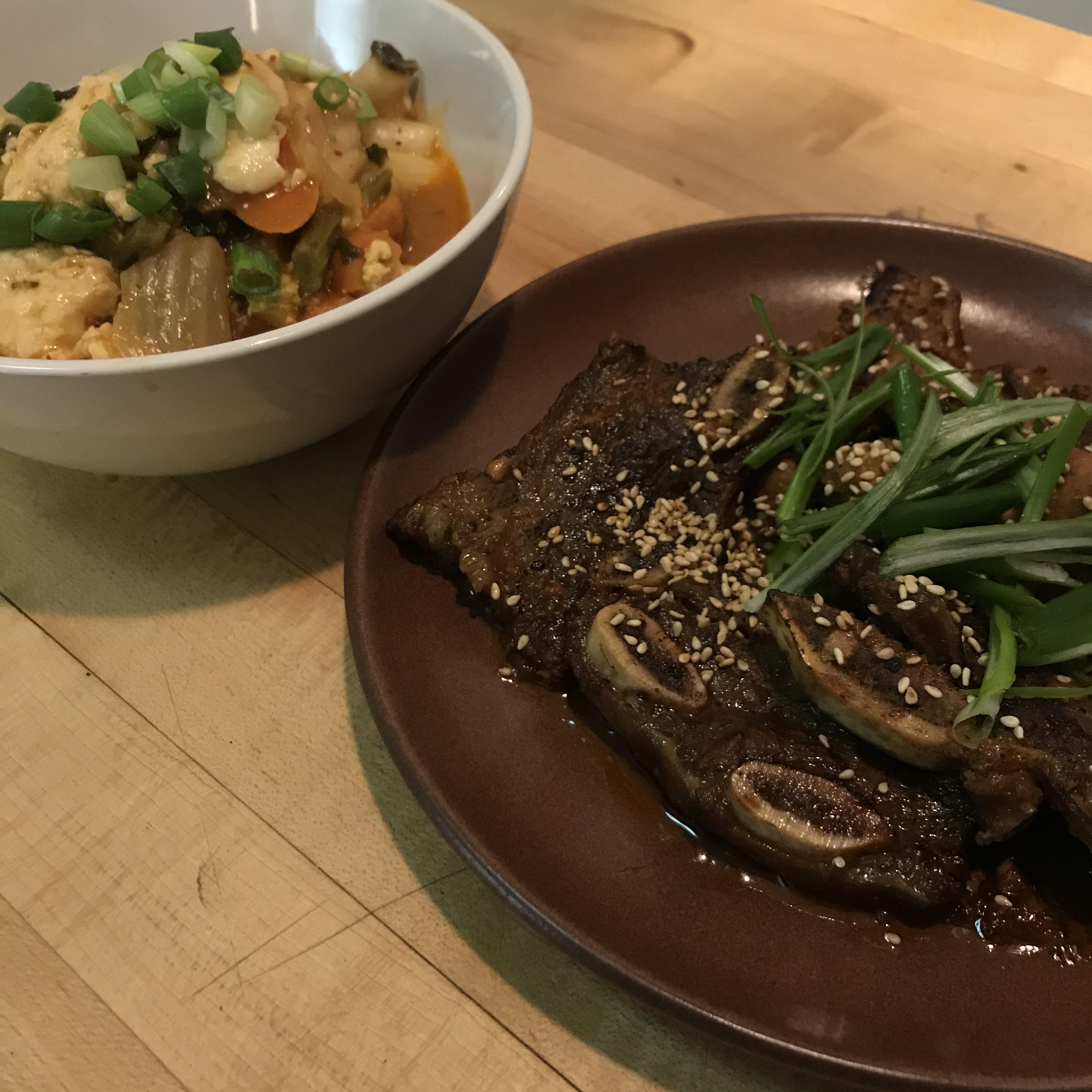 Kimchi Soondubu Jjigae with rice cakes + Bulgogi beef r/tonightsdinner