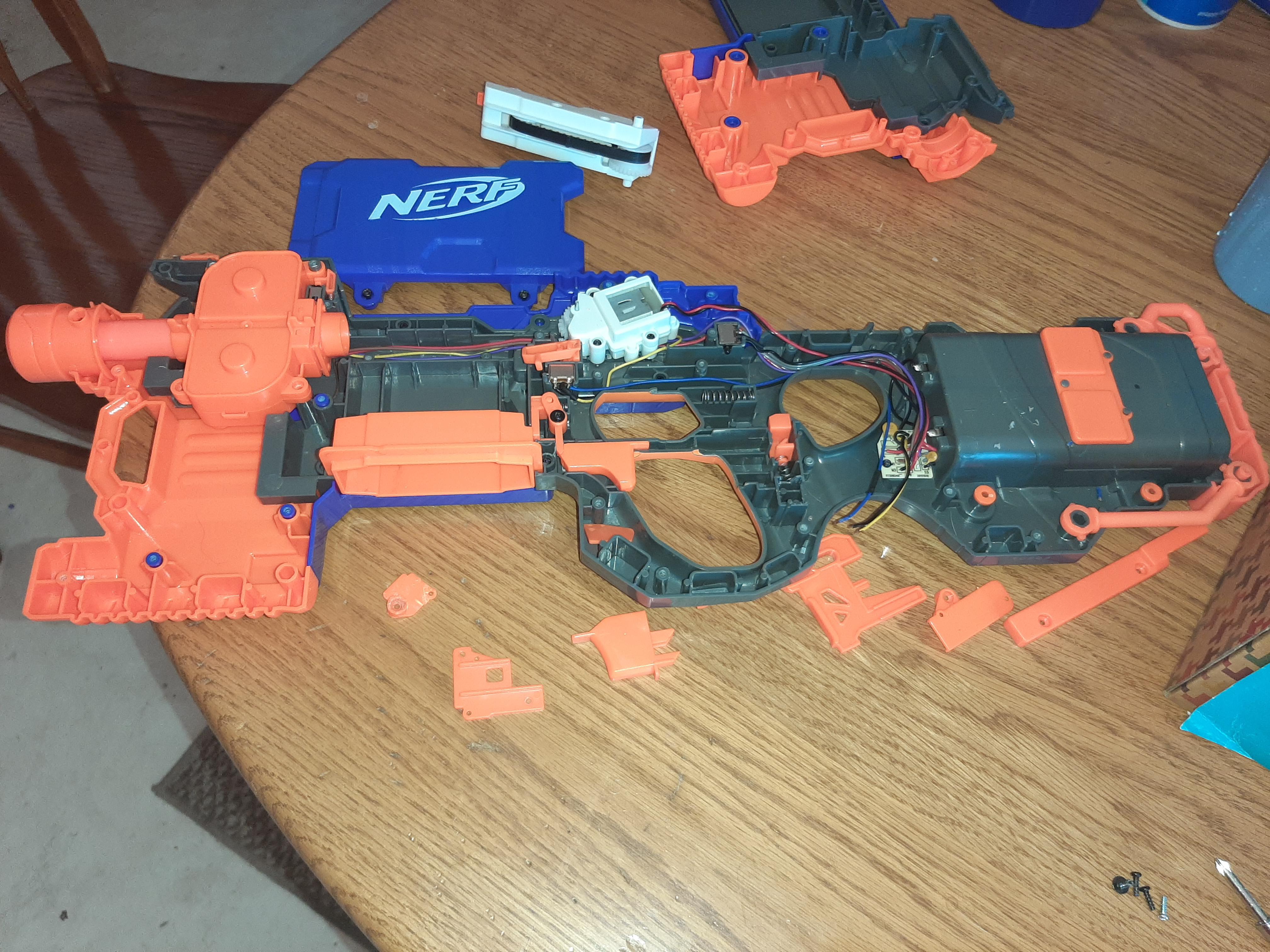 I just opend up my nerf hyperfire blaster because it wasn't revving up