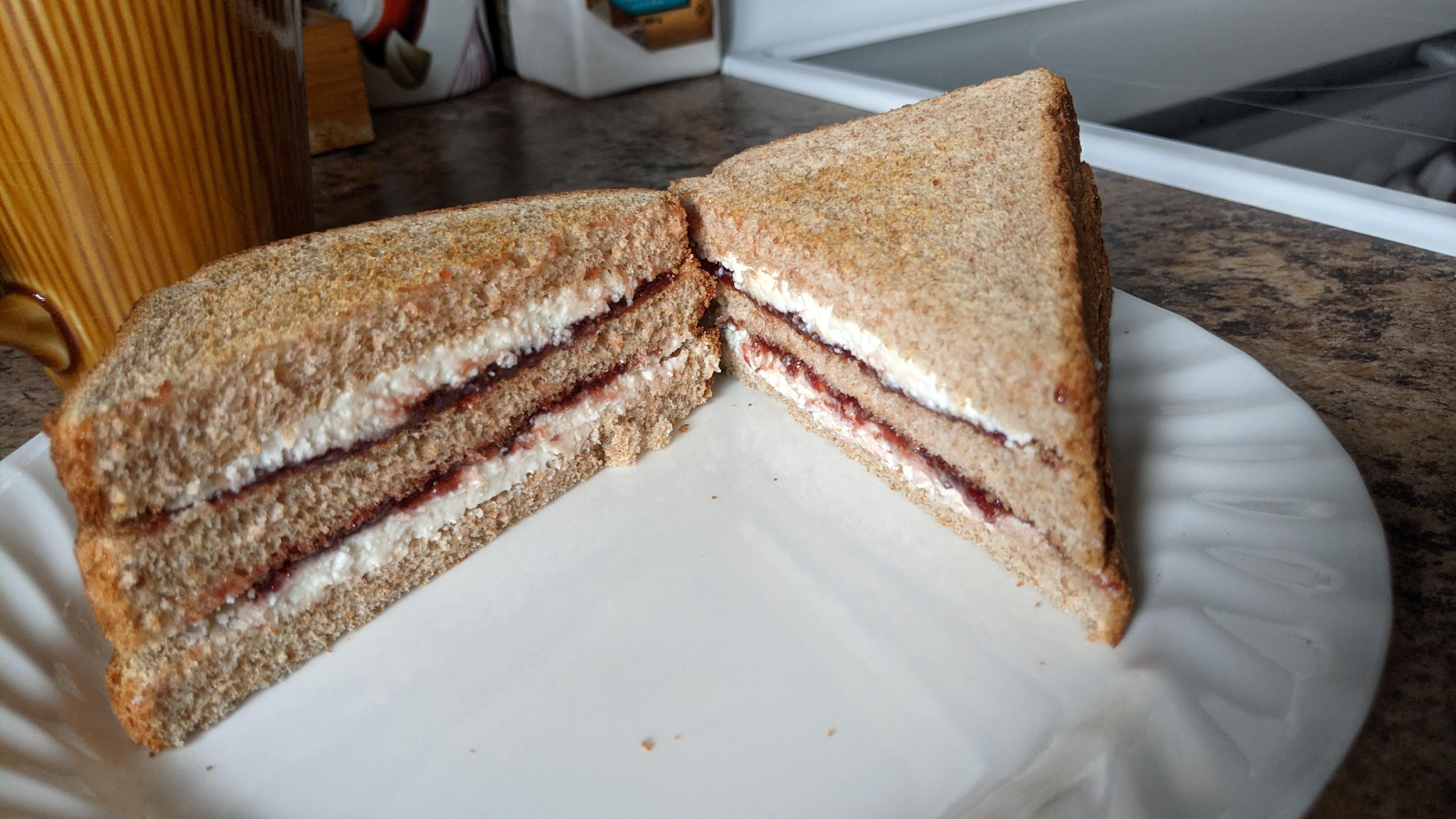 Today's triple. Ricotta and jam on brown toast. r/Sandwiches