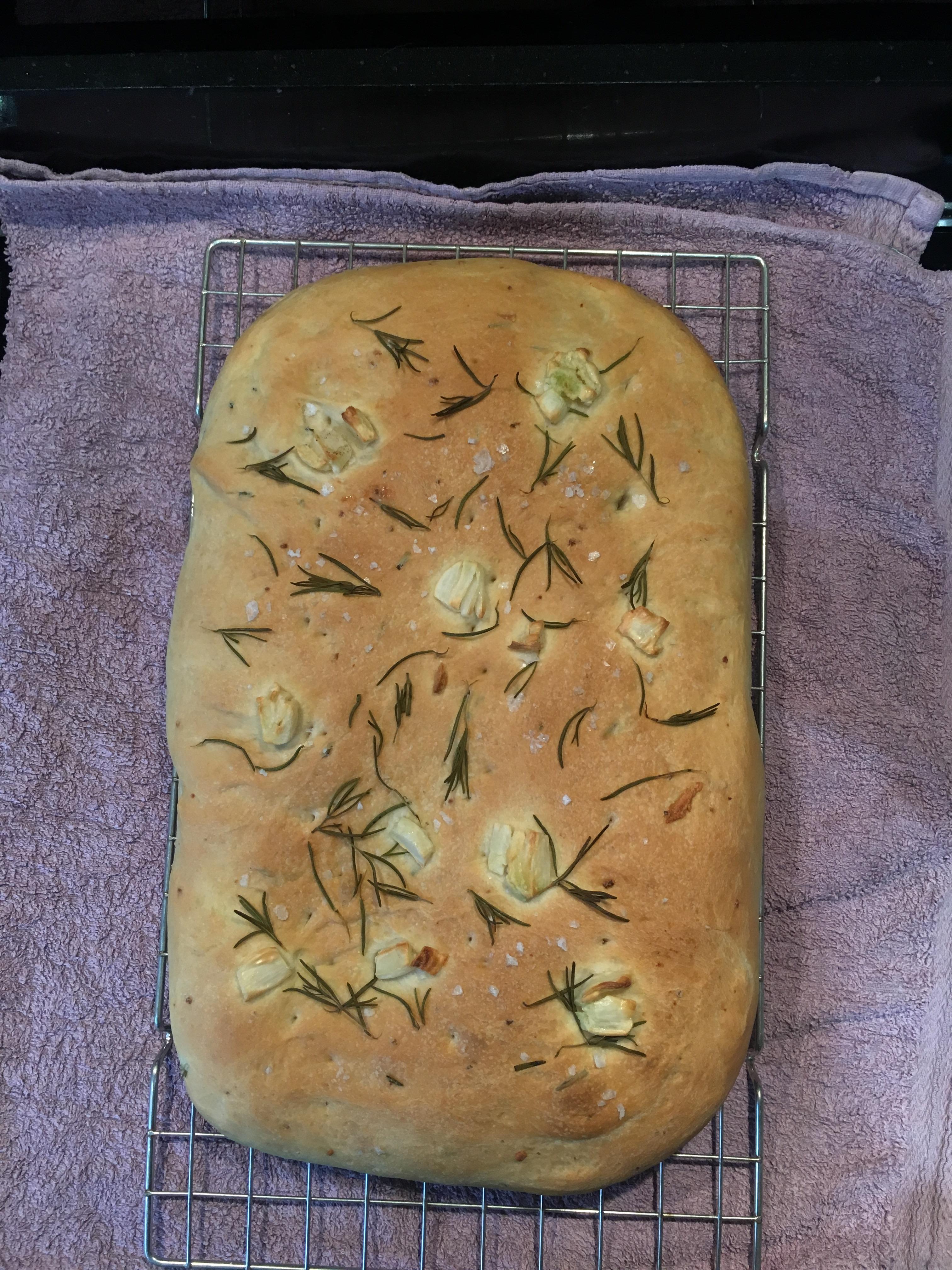 My second attempt at bread, a rosemary and garlic focaccia! r/Breadit
