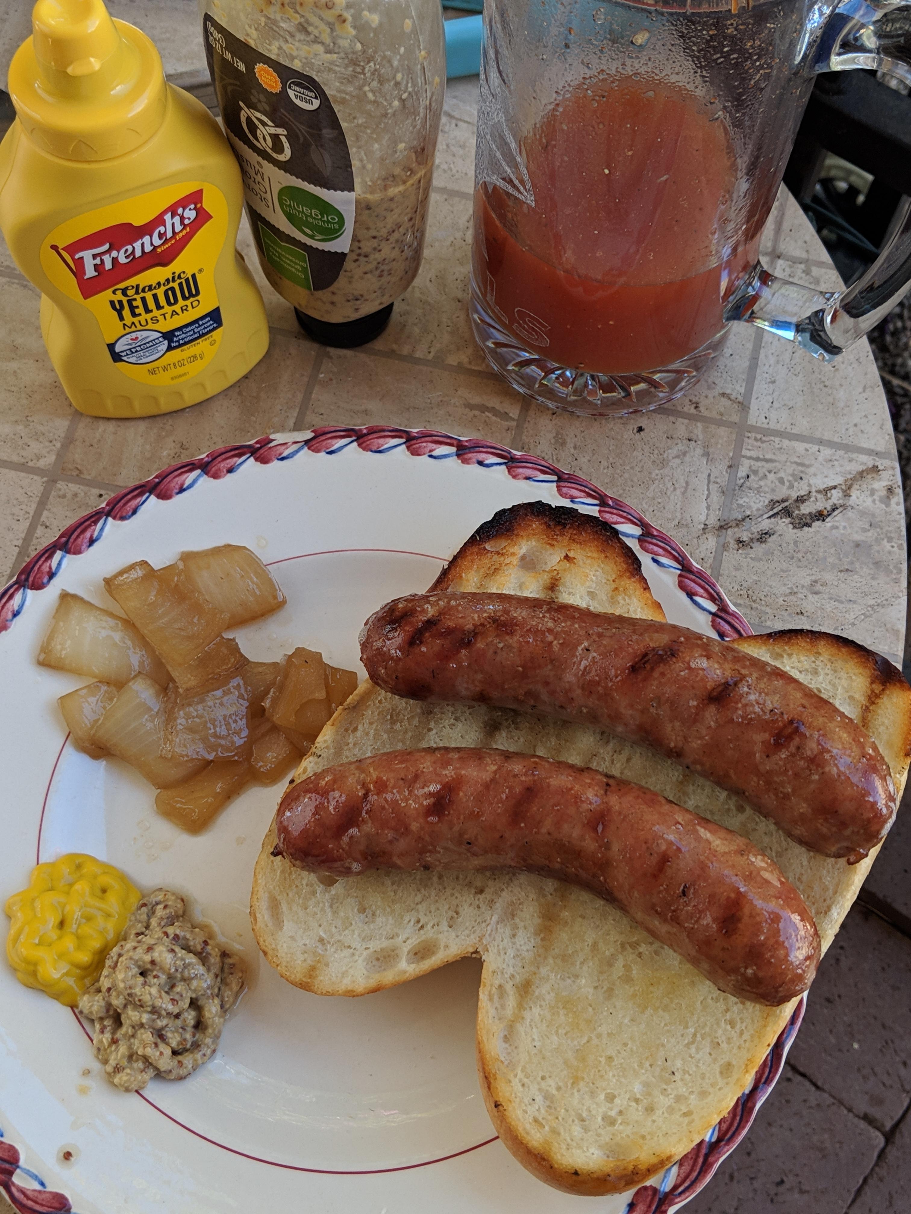 Beer braised brats. 1 hr at 275 in cast iron with onions, butter and