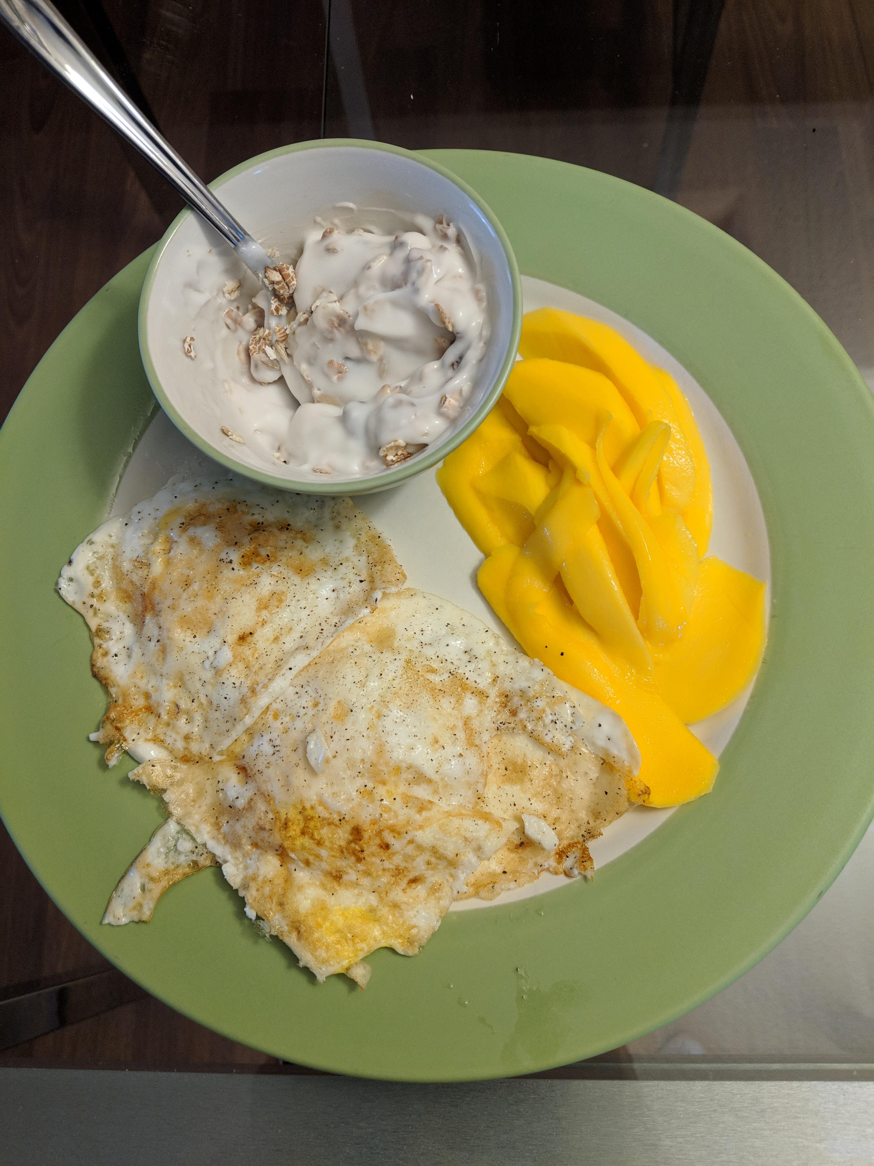 Trying to be healthy... Fried eggs with coconut yogurt parfait and