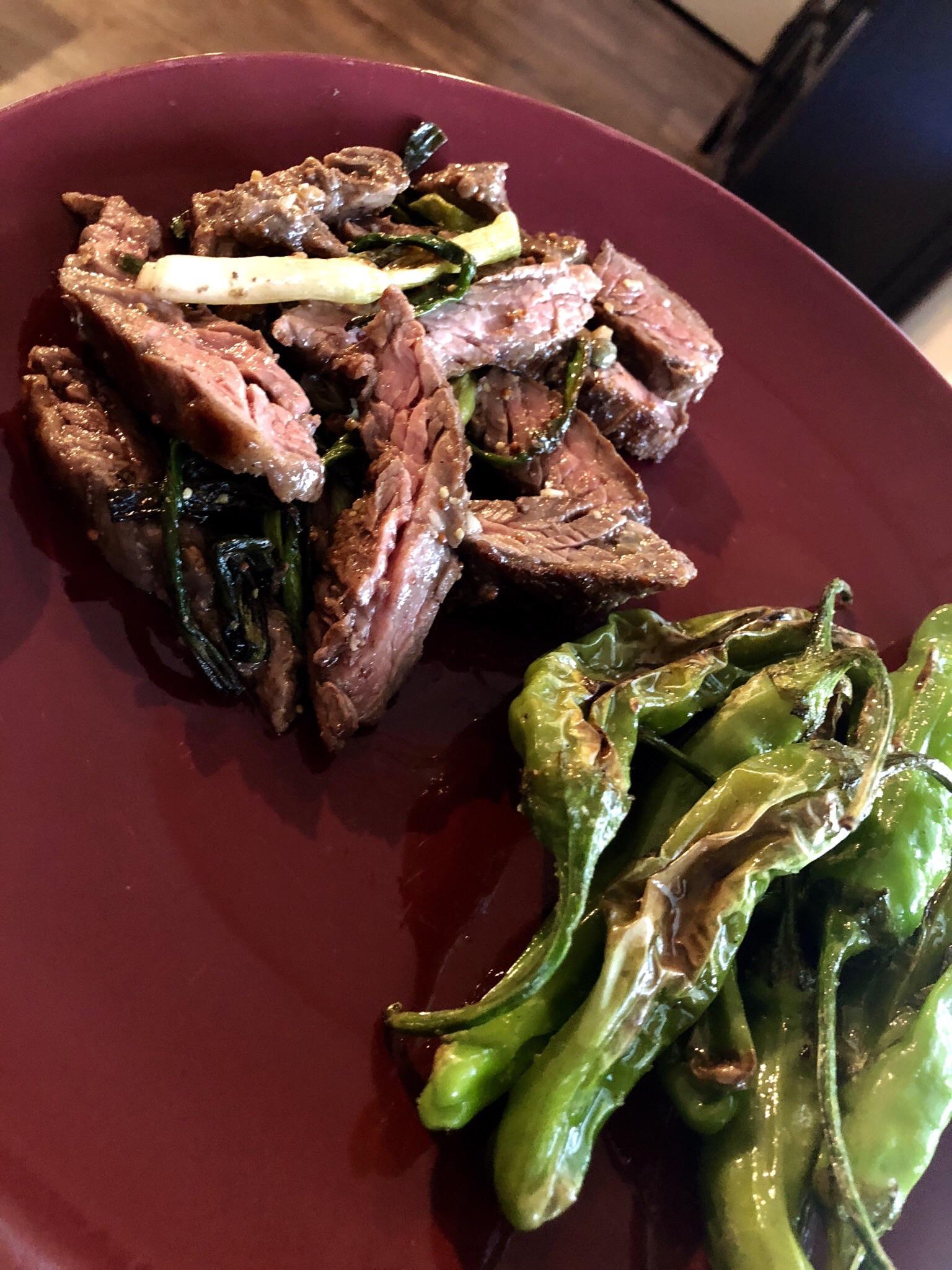 Skirt steak with charred scallion sauce and shishito peppers r/whole30
