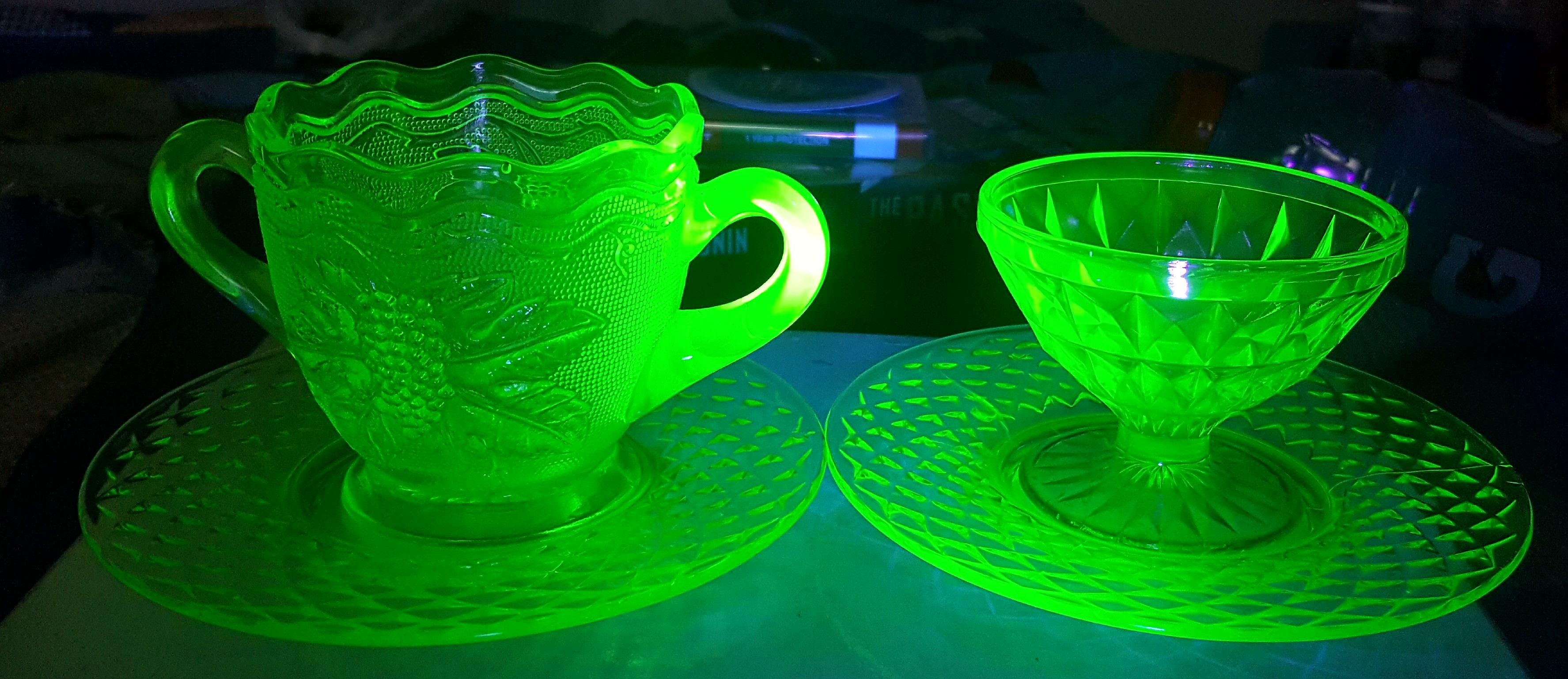 A blacklight causes these dishes to glow due to the presence of uranium
