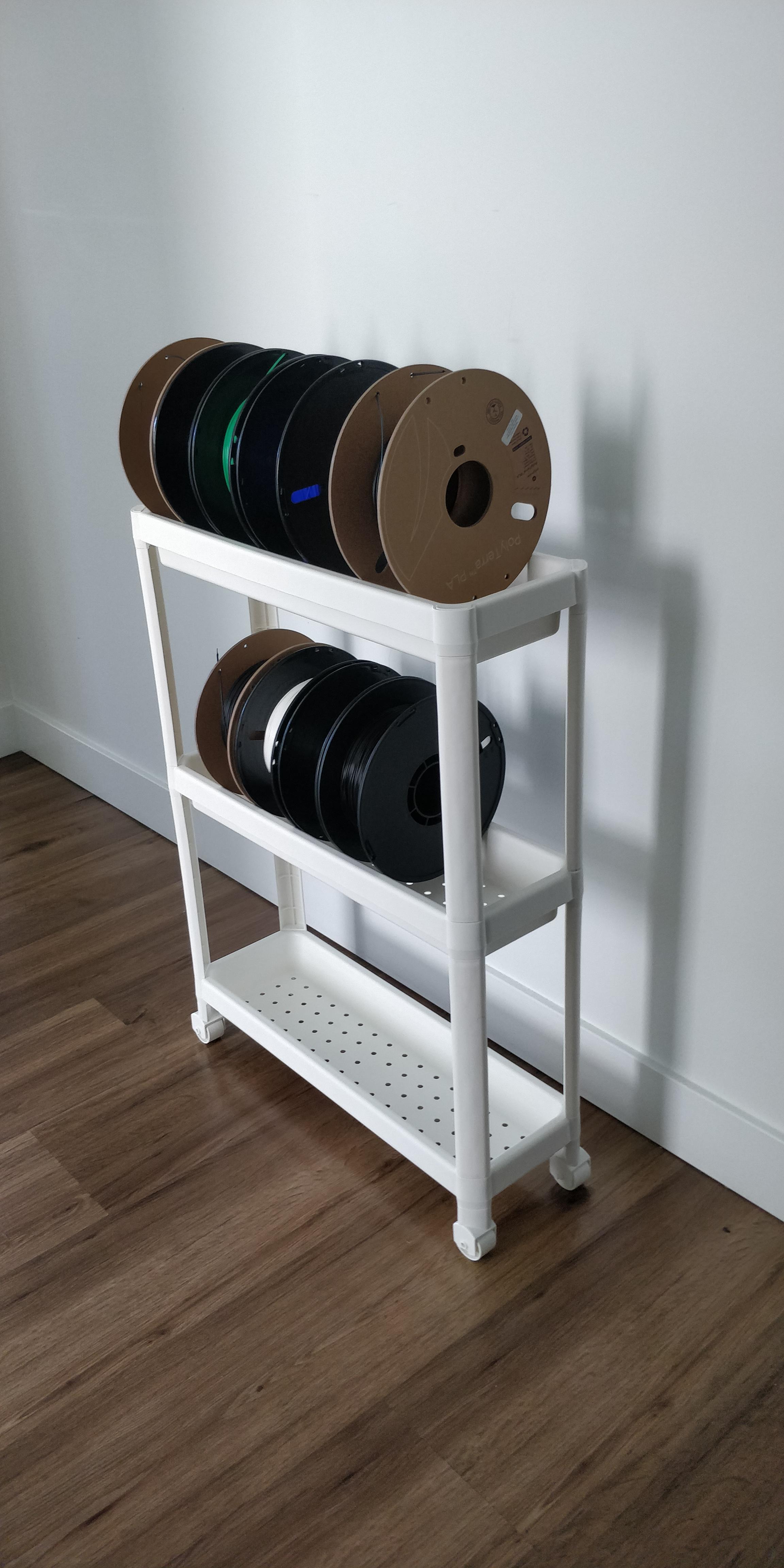 IKEA VESKEN makes a great, super cheap, compact filament rack. r