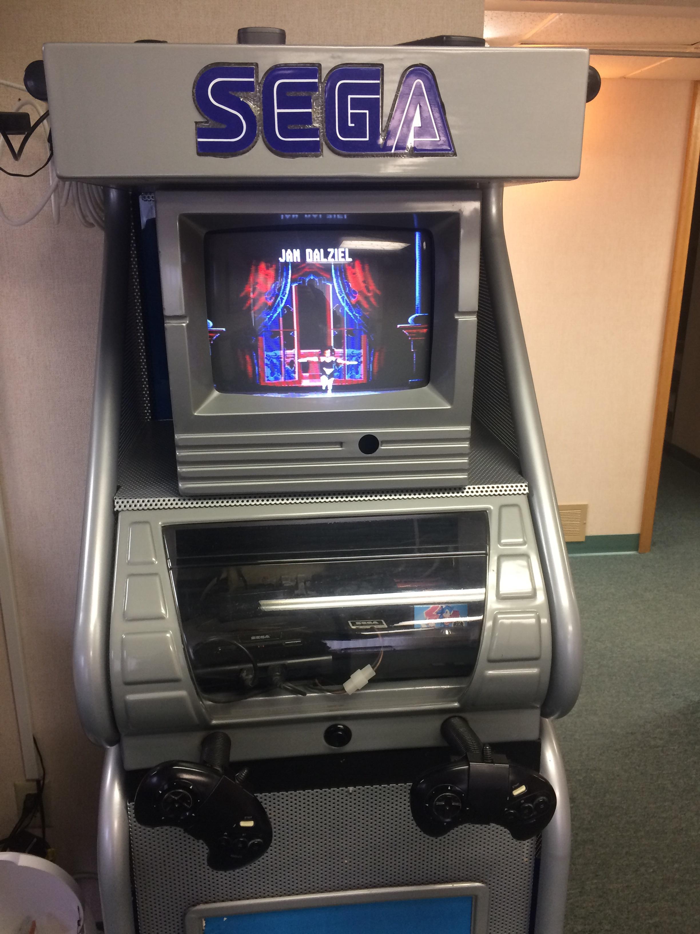 This Sega Genesis multi arcade machine at my son's dentist... r/gaming