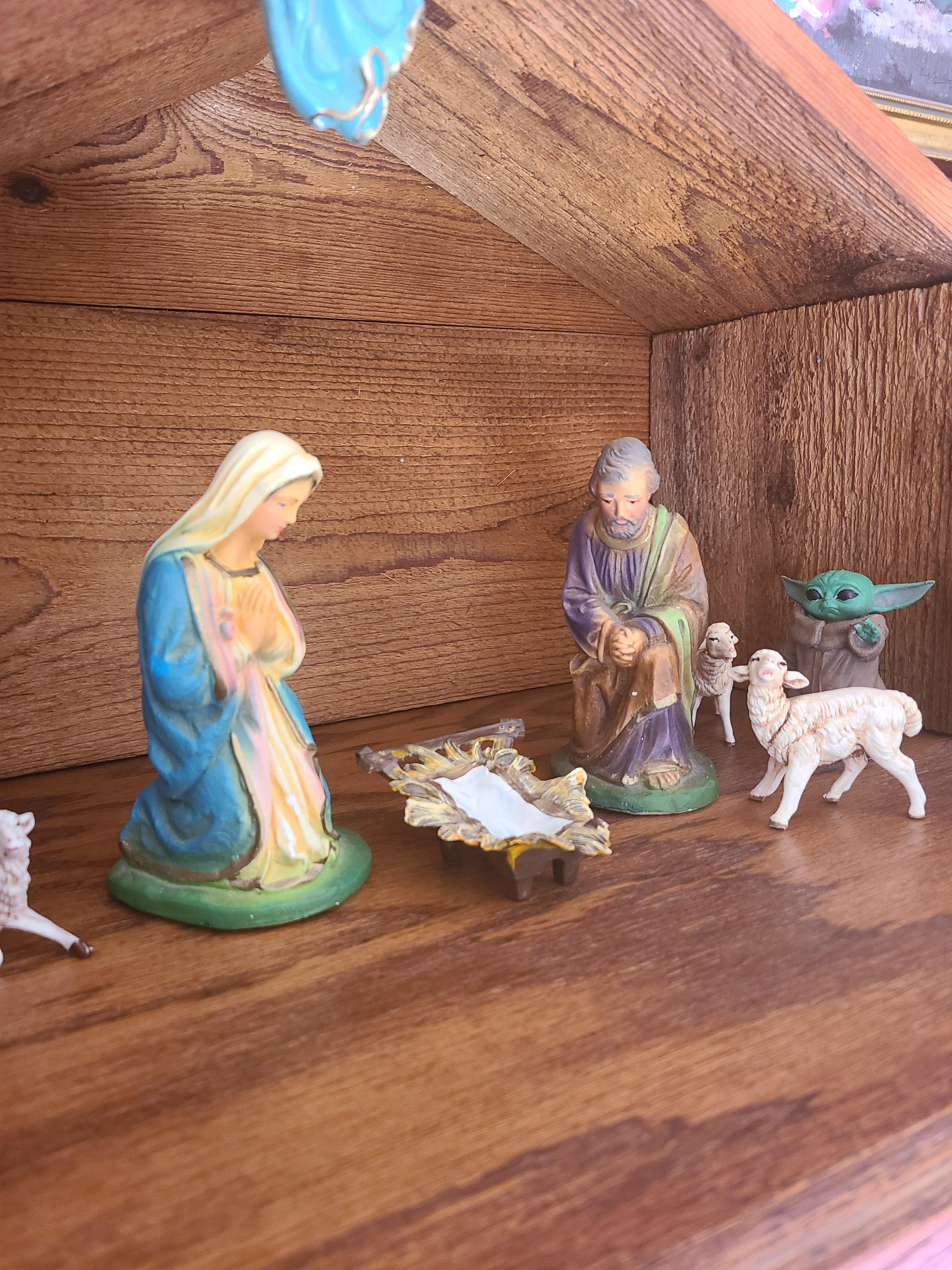 Hiding Baby Yoda in the Nativity scene day 1. r/StarWars