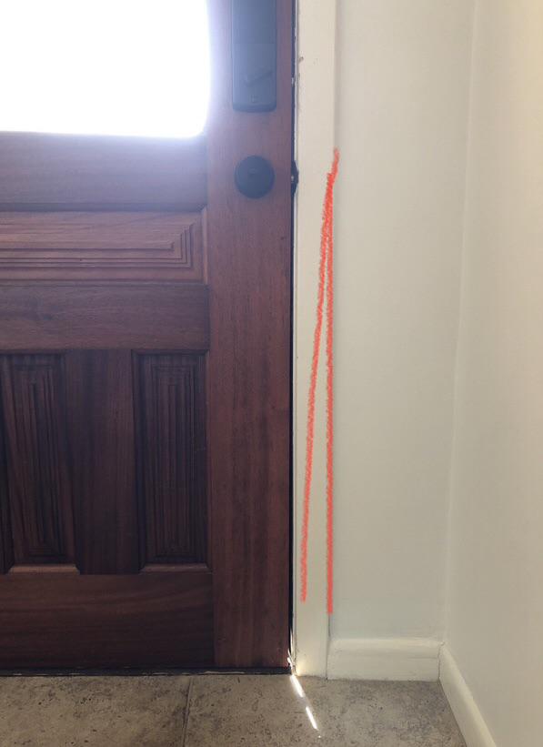 How to adjust a gap in door not plumb with the frame? (Indicated by red