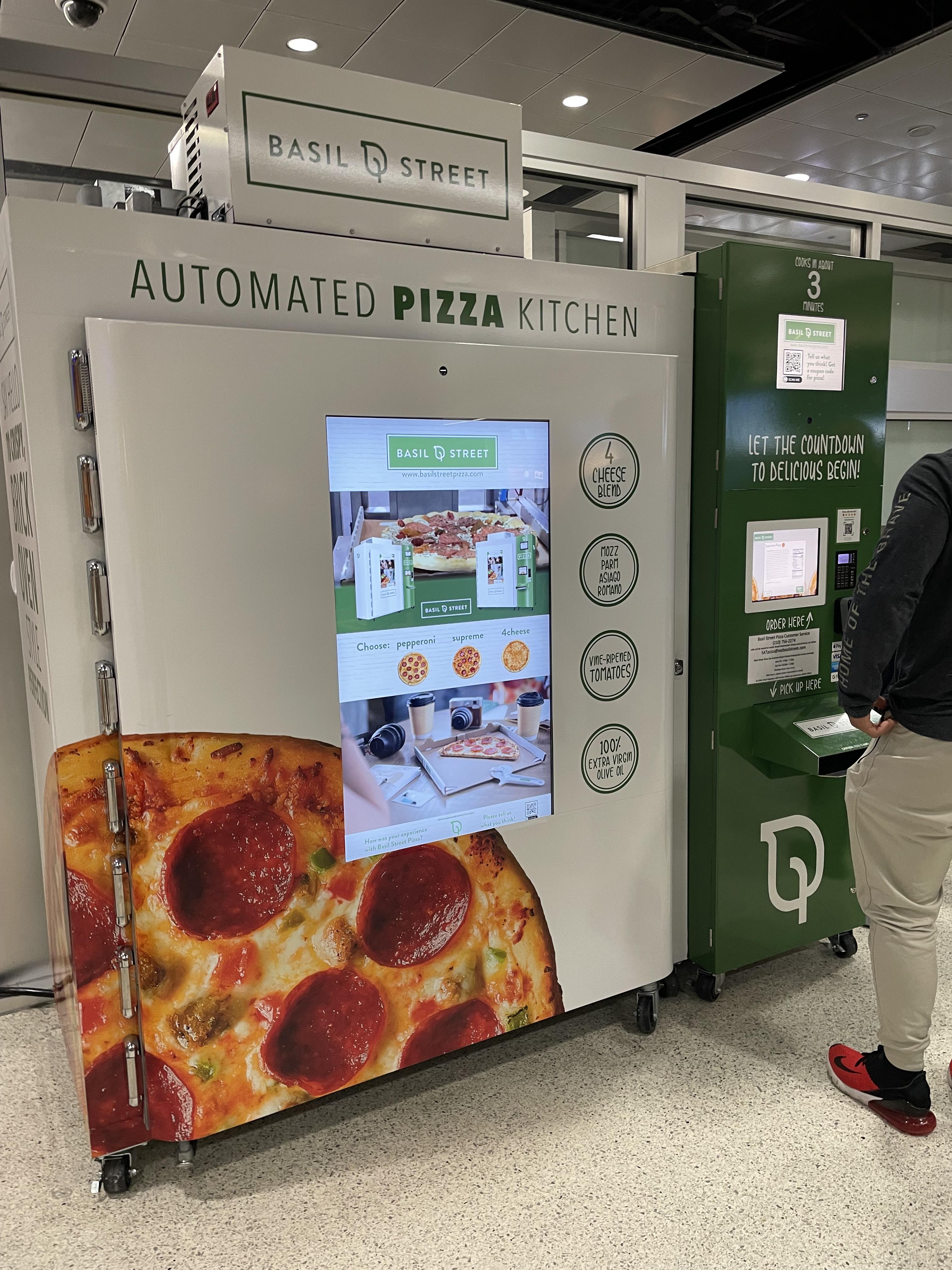 Pizza vending machine at the San Antonio Airport. Cooks you a pizza in