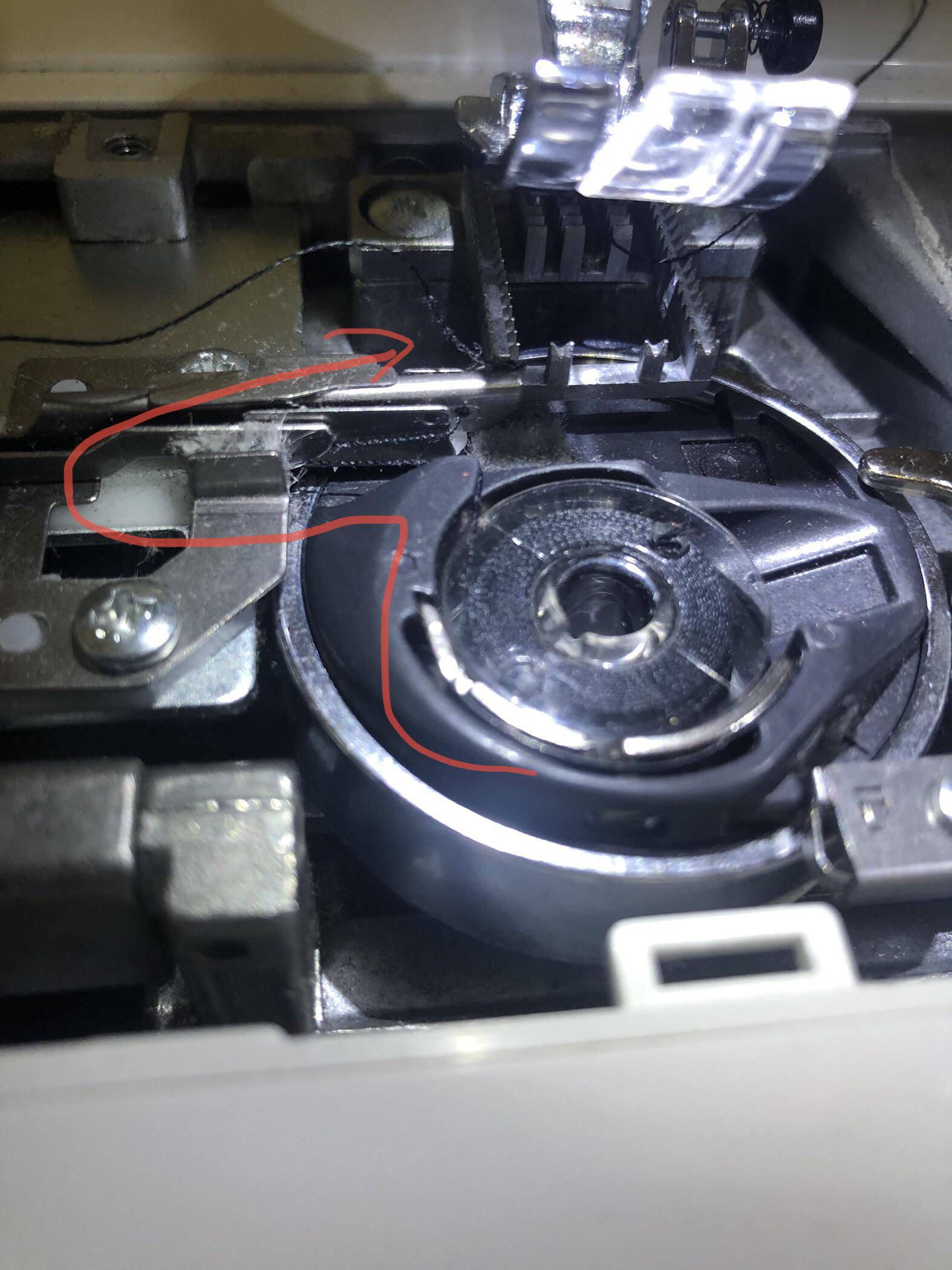 Help! My bobbin thread is getting caught on something and I don’t even