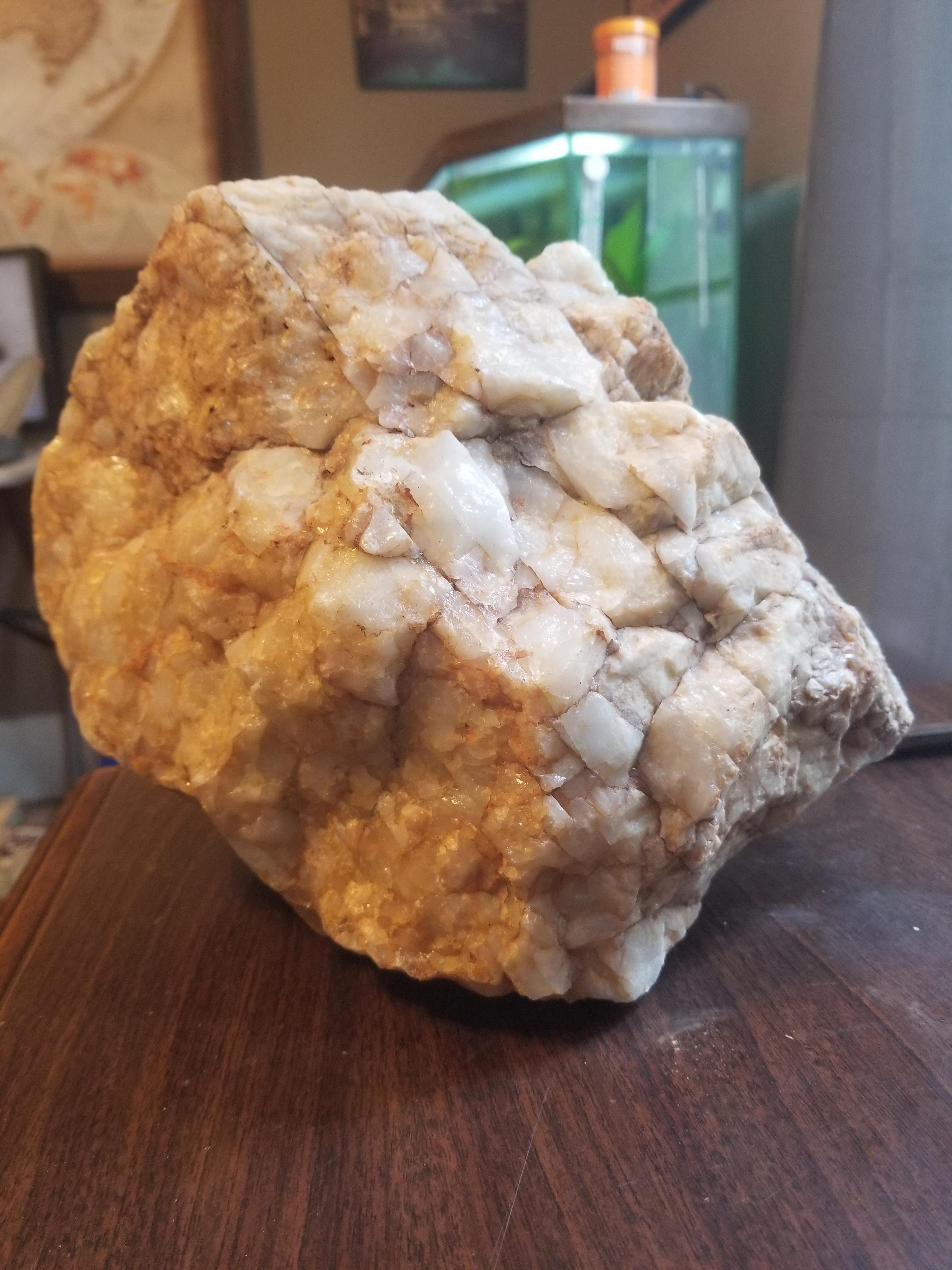 Milky quartz with rust intrusions. r/Minerals
