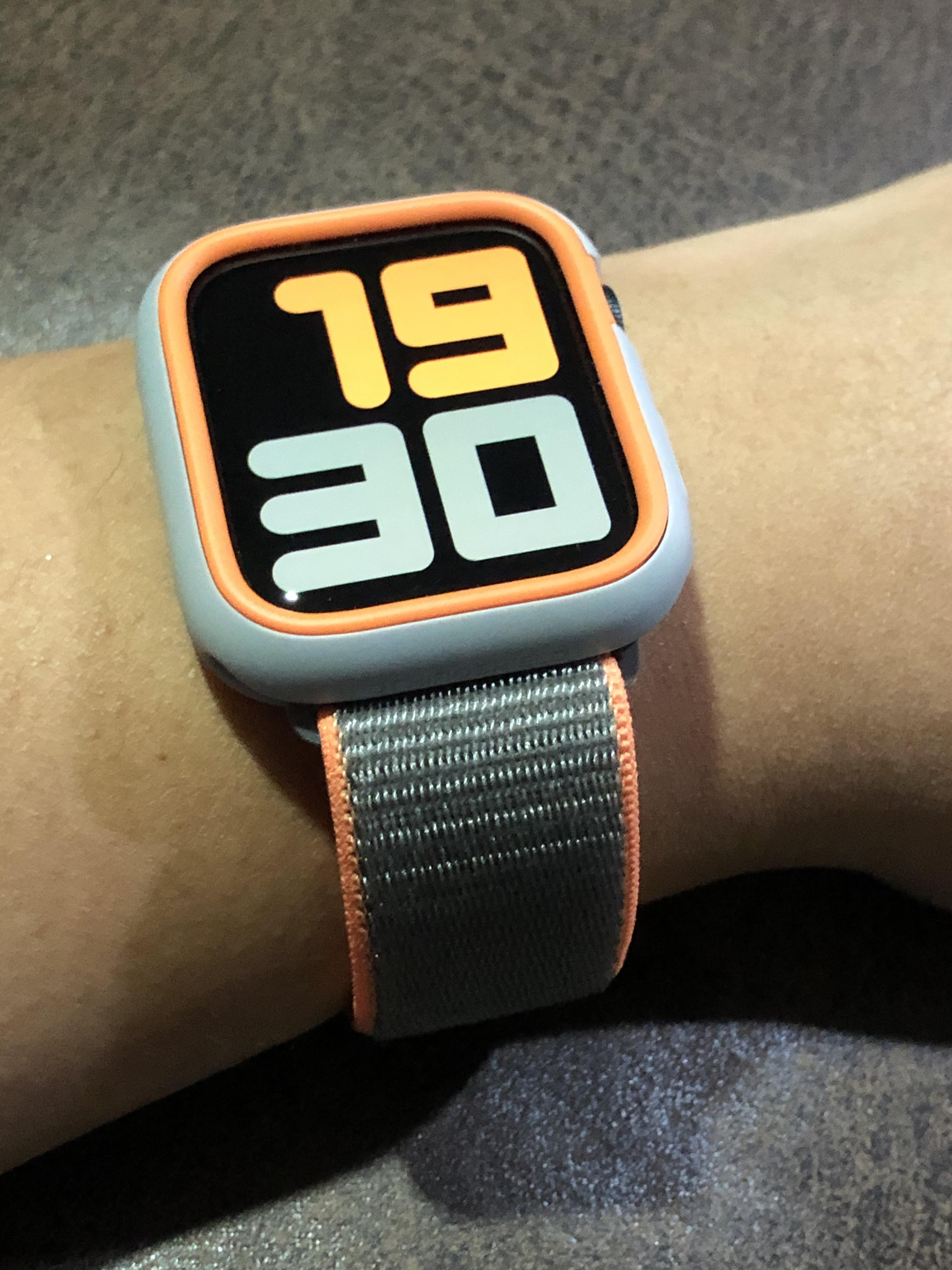 Series 5 with grey and orange Rhinoshield case and Apple