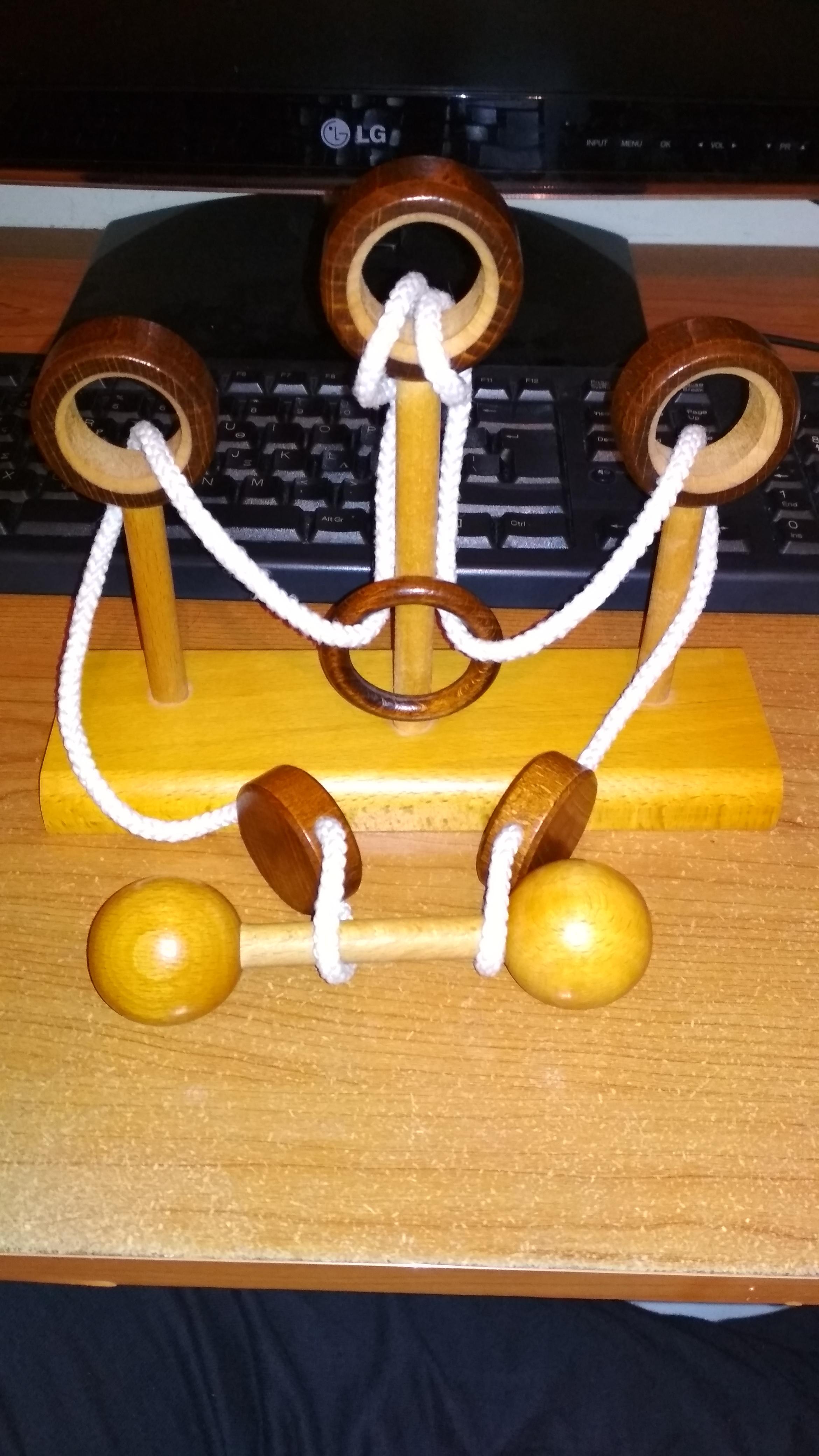 Ring and rope puzzle mechanicalpuzzles