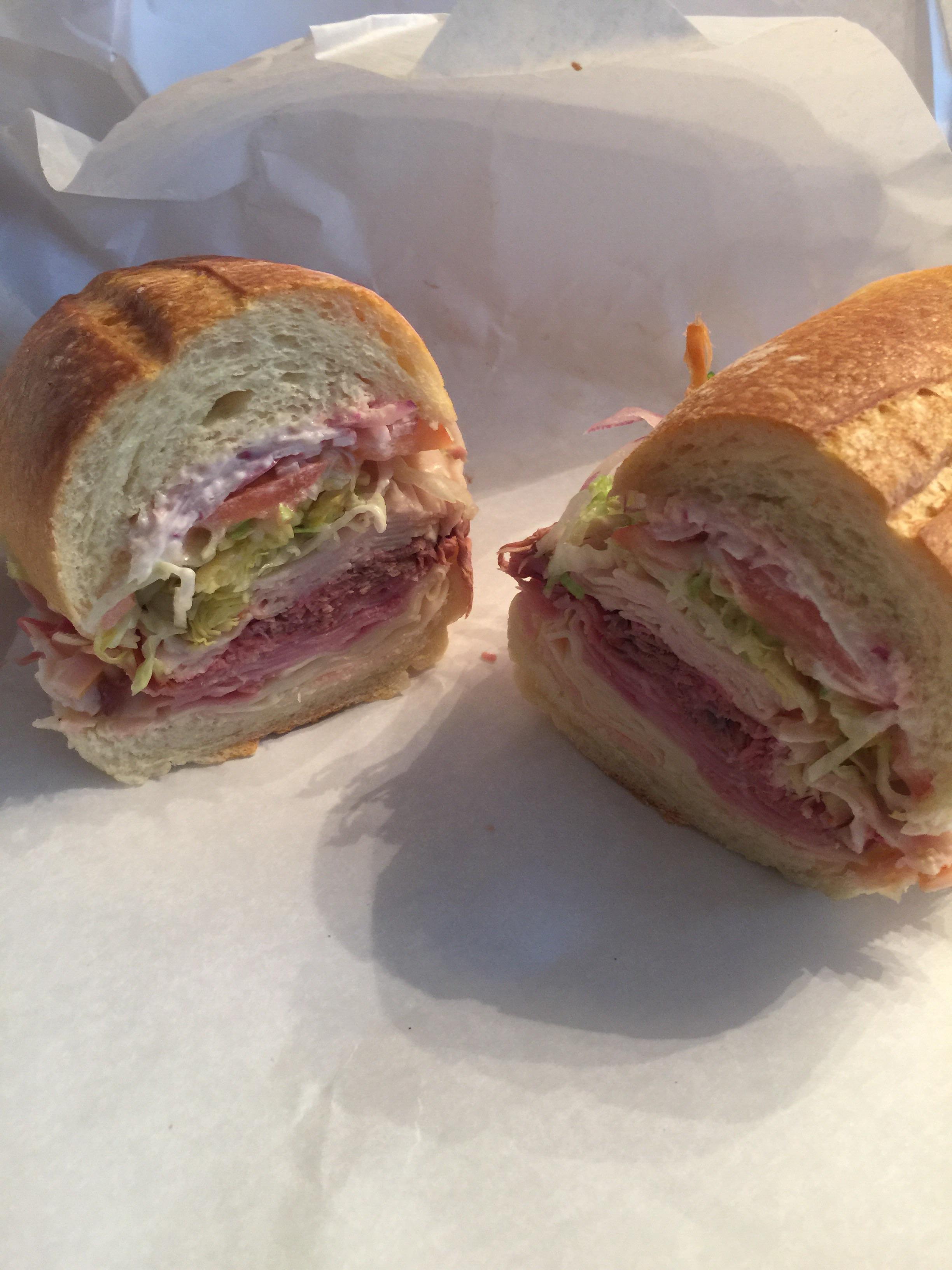 Roast beef, ham, turkey, Swiss on a hero r/eatsandwiches