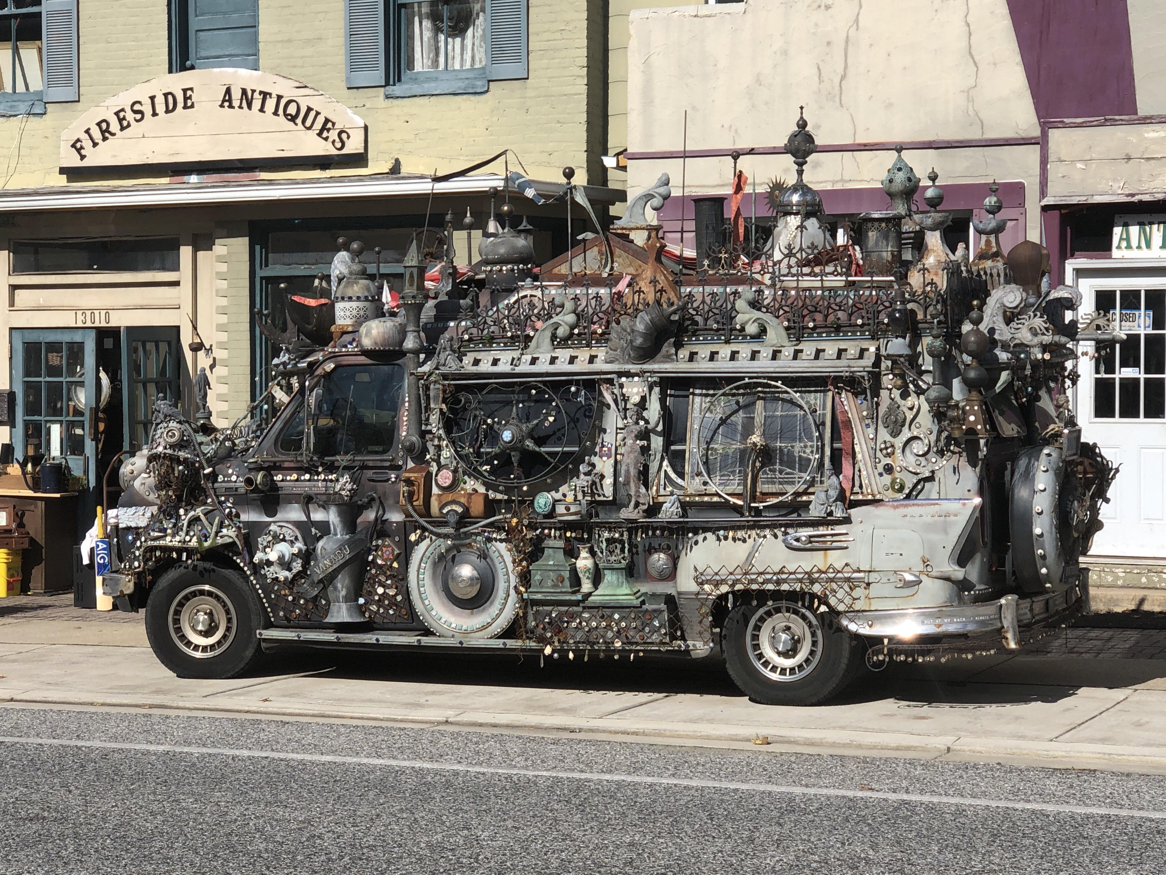 This van in front of an antique shop in Old Town Bowie, Maryland r