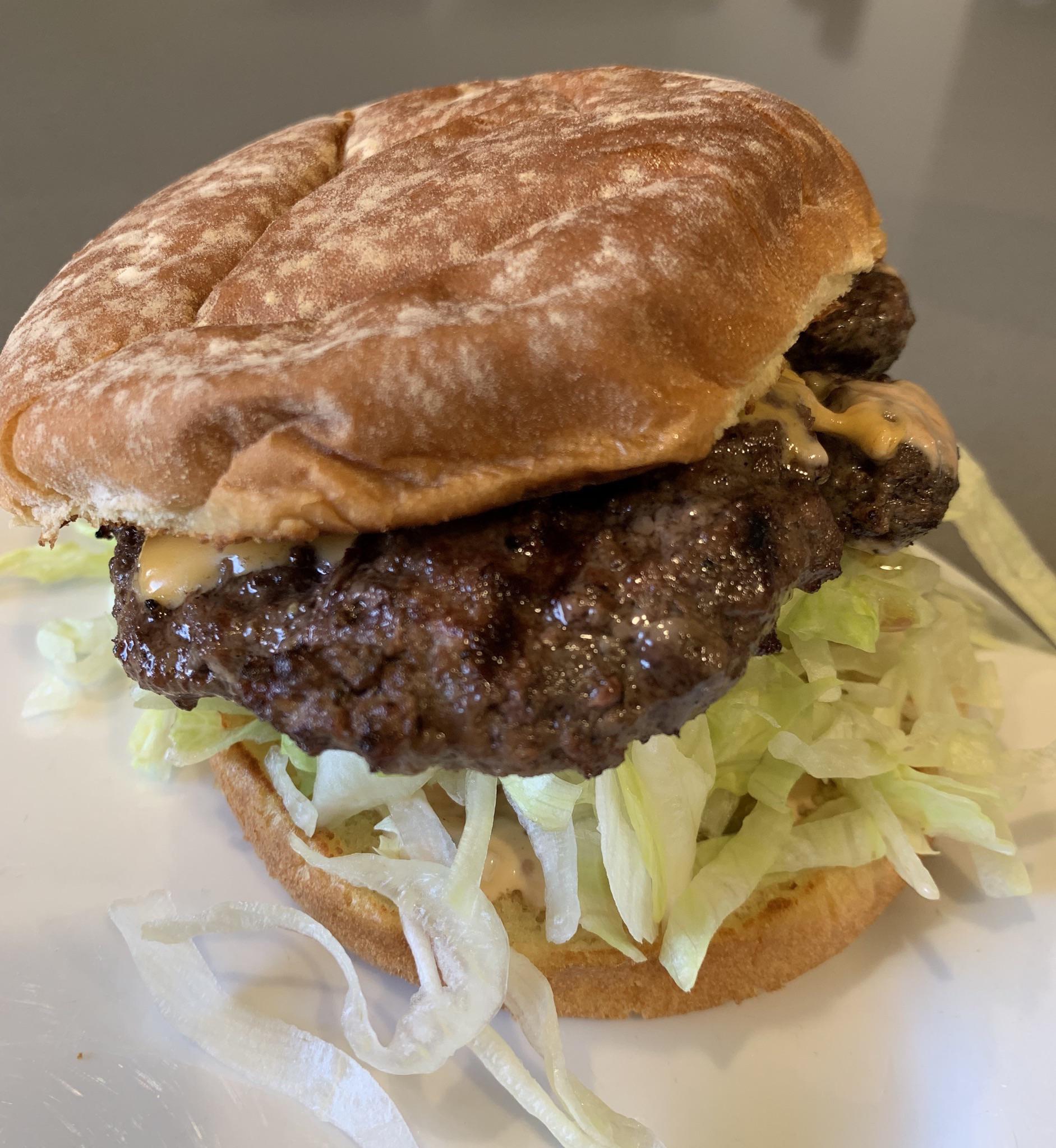 Just grilled this bad boy up, complete with homemade special sauce. r