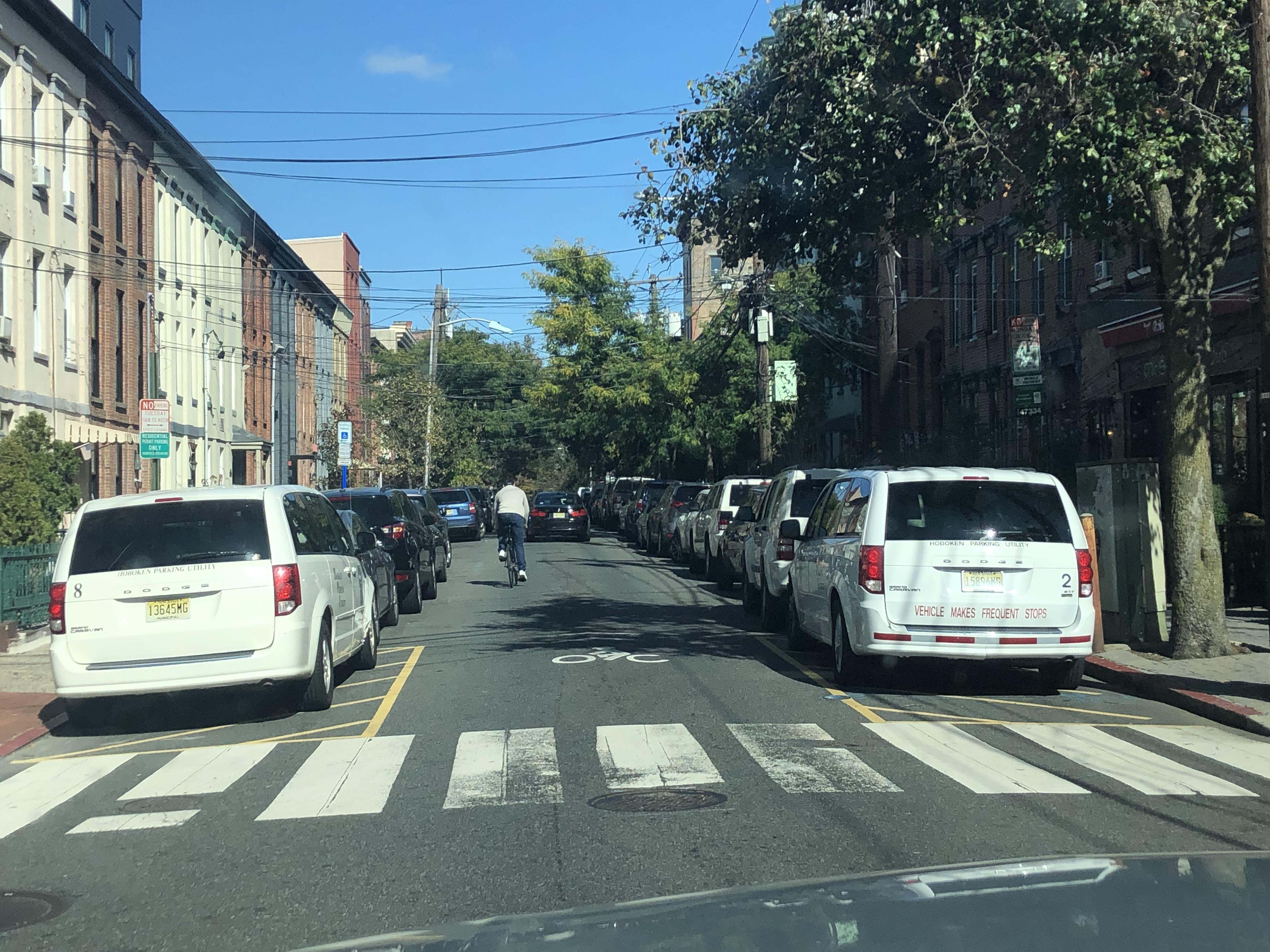 Not 1, but 2 Parking Authority vans parked in the yellow box! Great