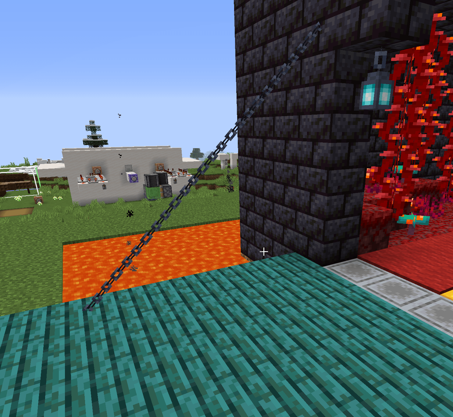 Diagonal chains with minecarts for my nether themed castle's drawbridge