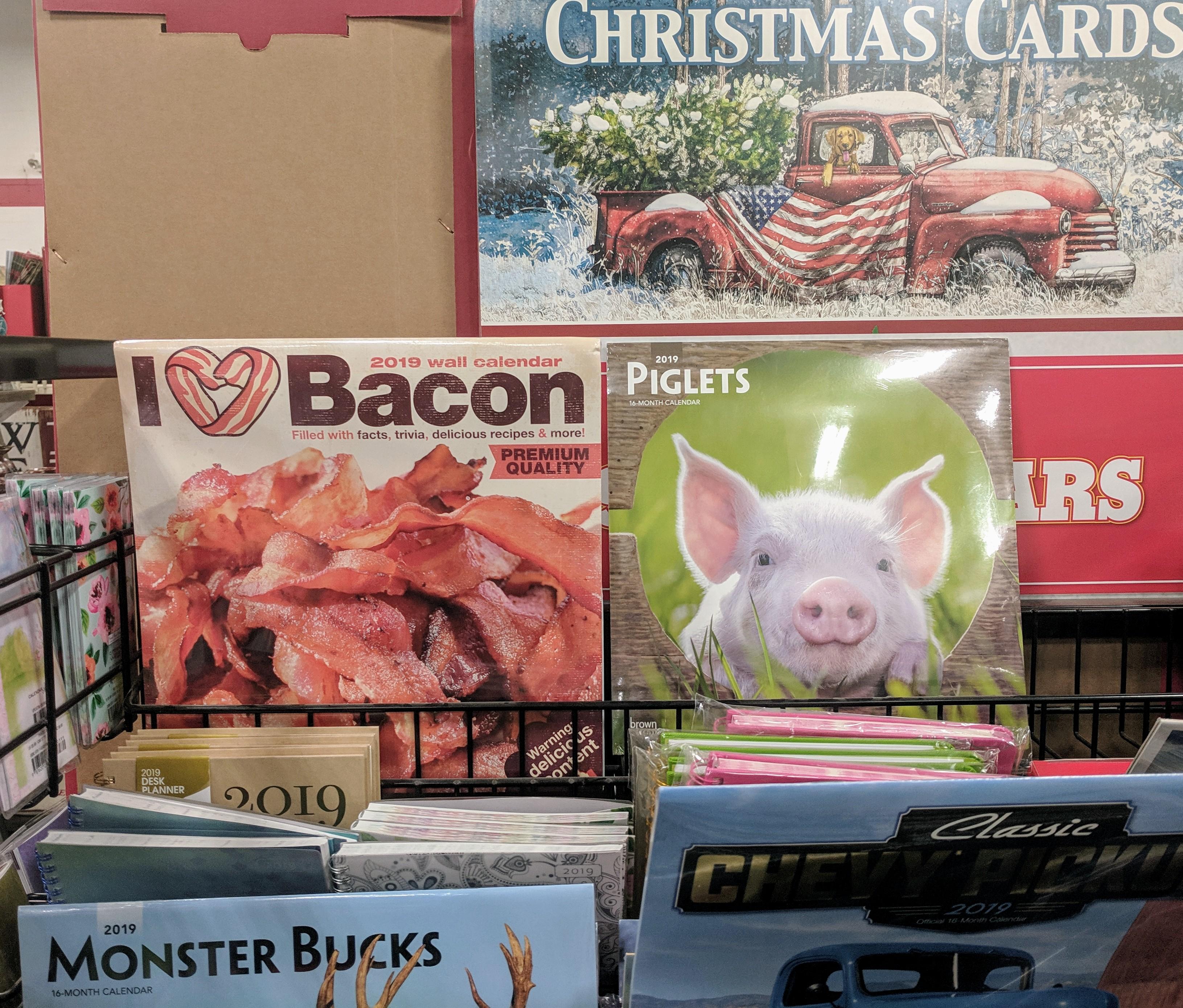 Two different pig calendars at the Tractor Supply. r/mildlyinteresting