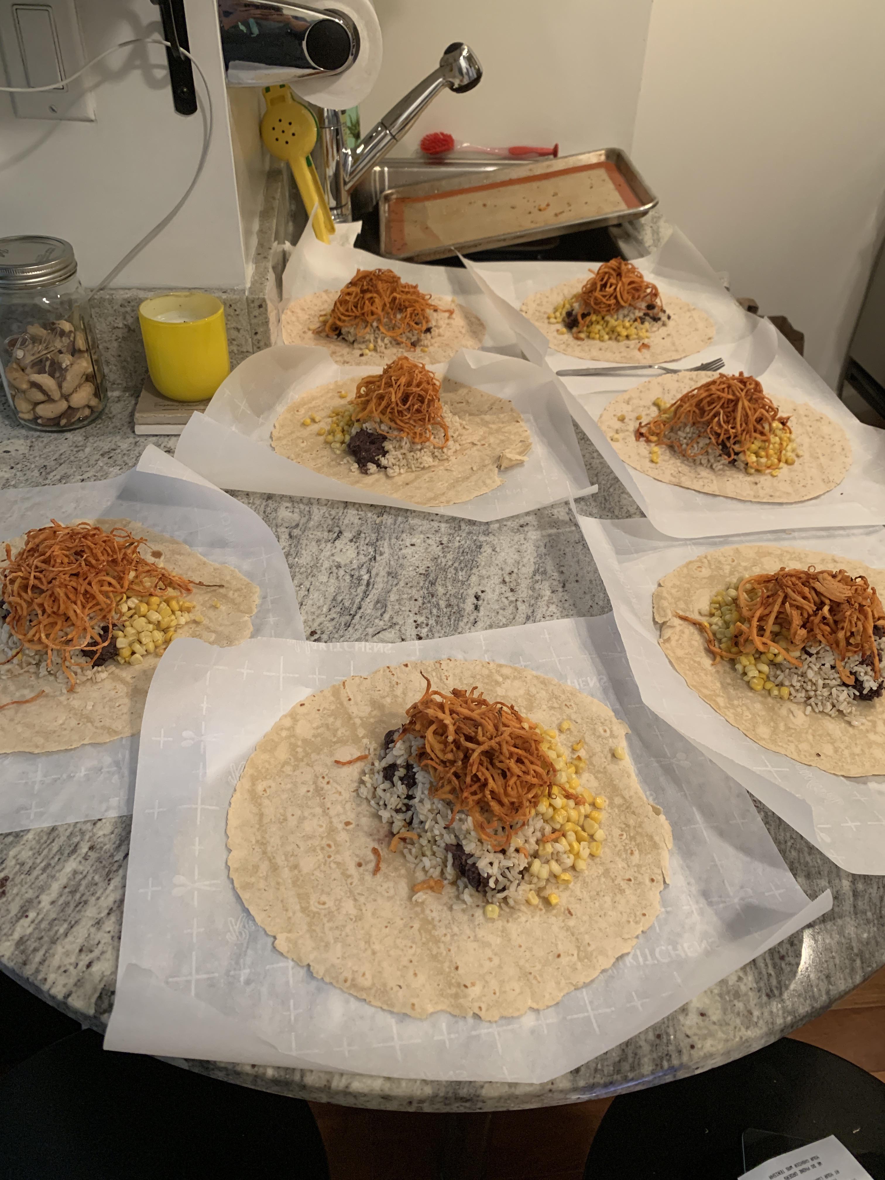 WFPB freezer burrito meal prep for the next 7 days. Black beans, brown