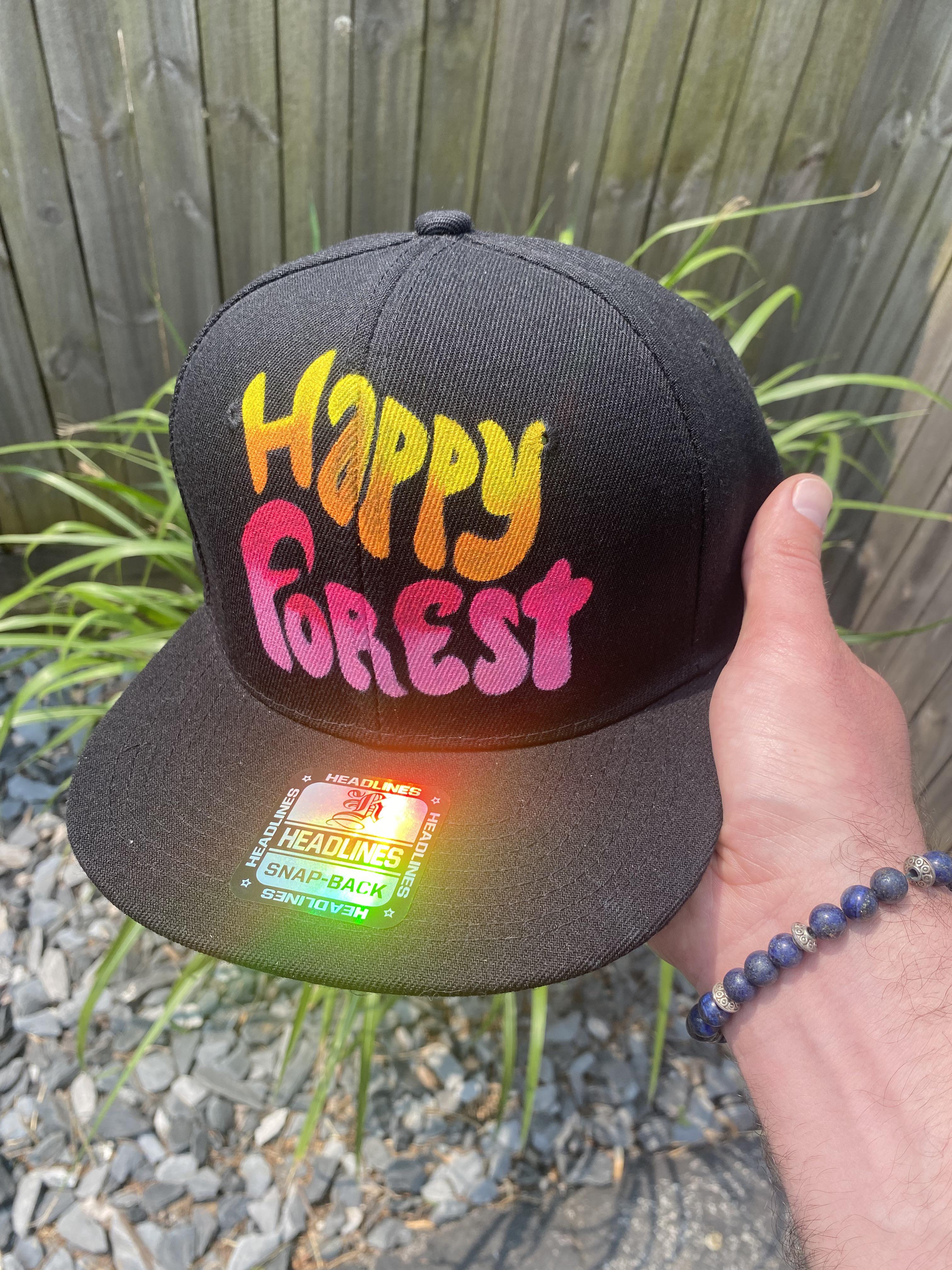 Happy Forest hat I painted (this was my first time painting a hat and I liked it) r/ElectricForest