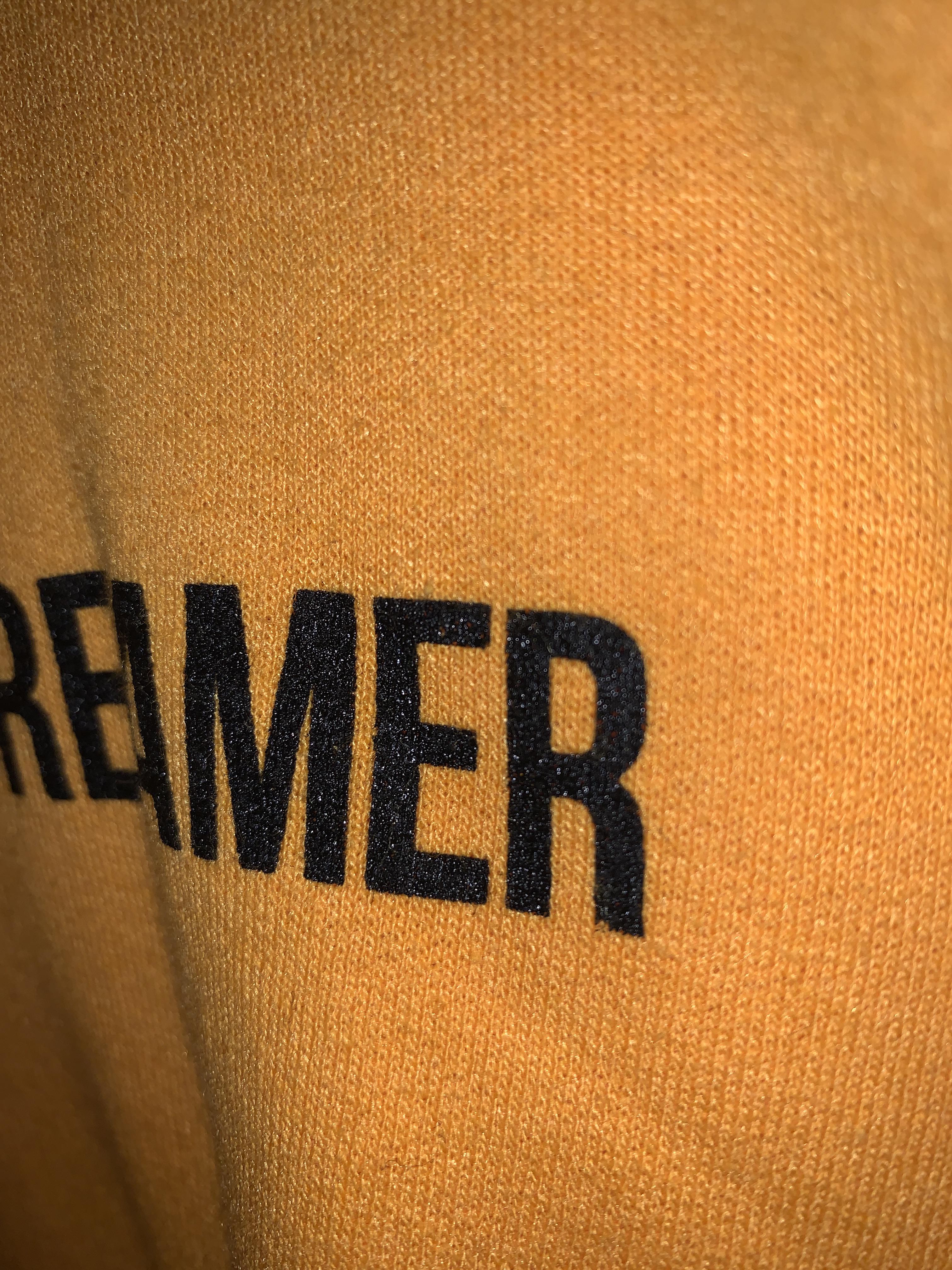 Can someone help me how to remove this vinyl off this hoodie? The