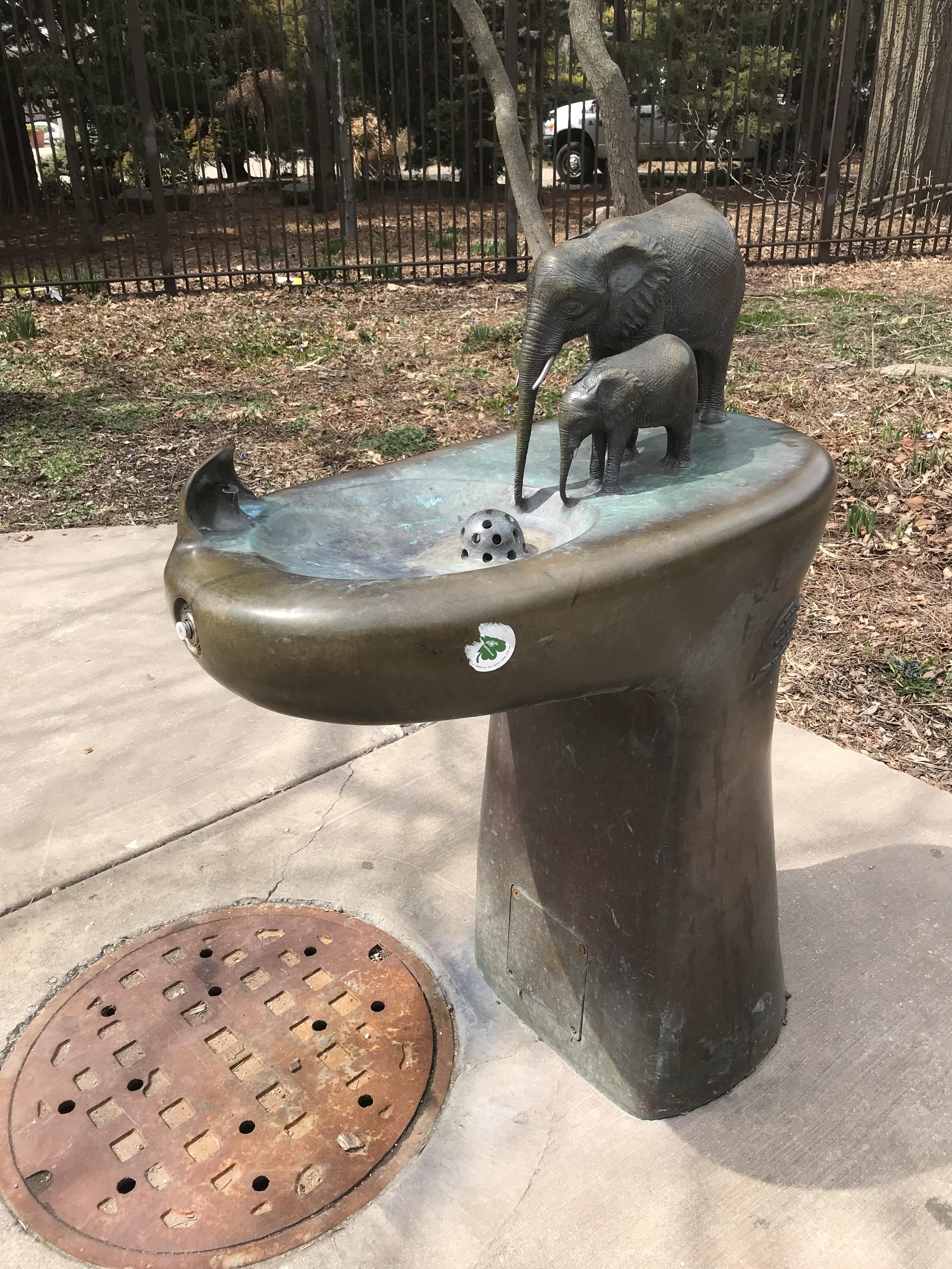 This drinking fountain at the Lincoln Park Zoo looks like 2 elephants