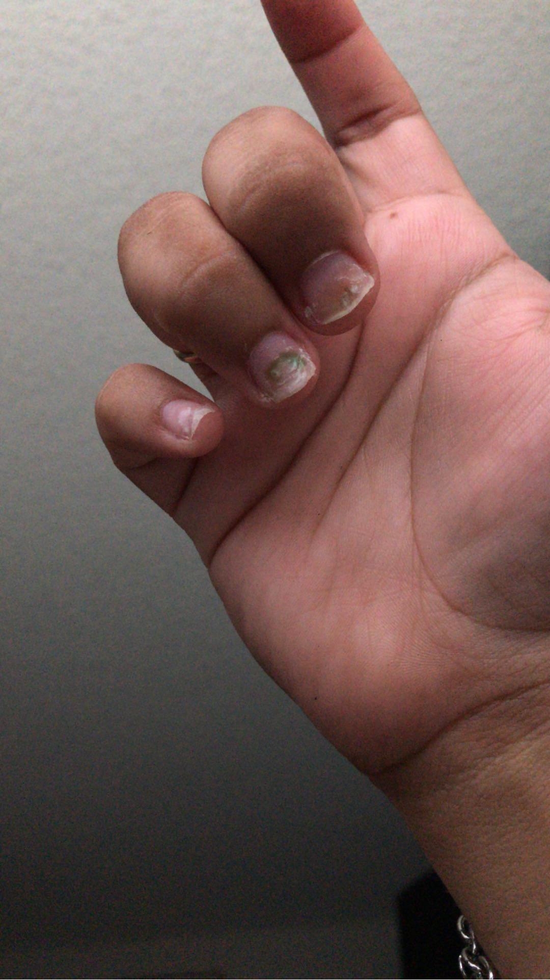 Just took of my acrylics and this green boot was in one of them and it