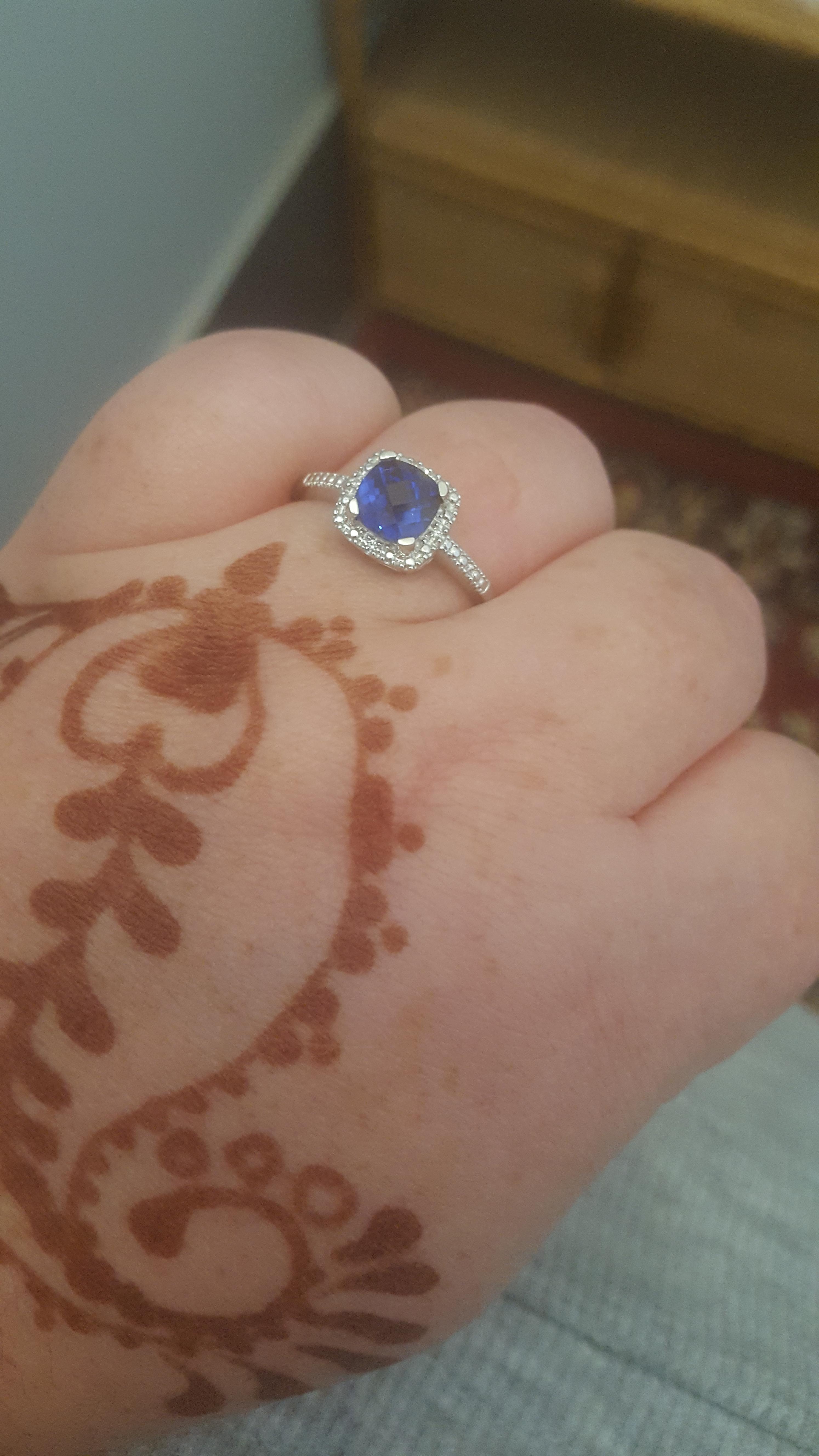 My engagement ring finally came in. Darn chubby fingers meant it was a