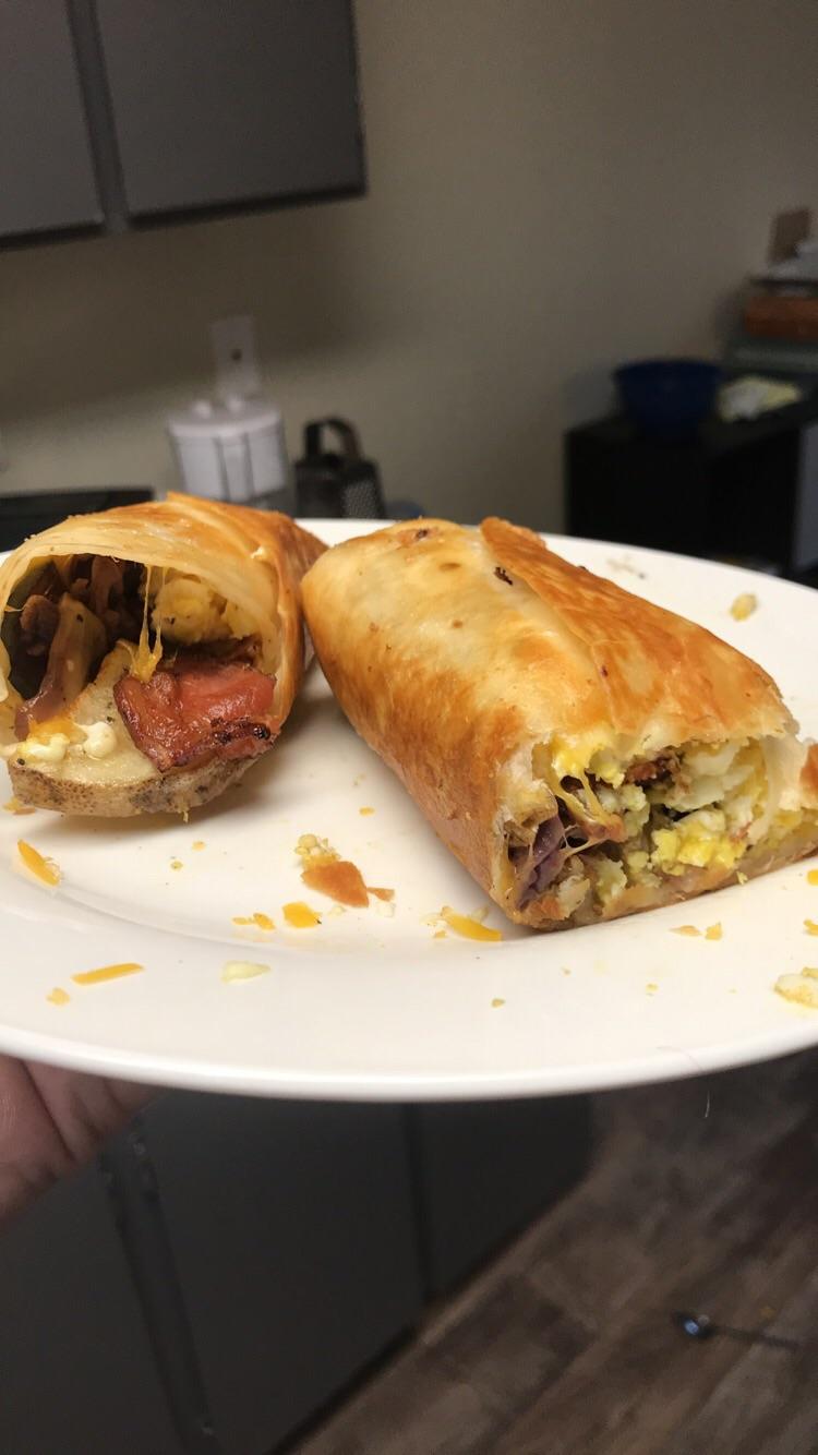 [Homemade] Fried breakfast burrito with eggs, bacon, and potatoes r/food