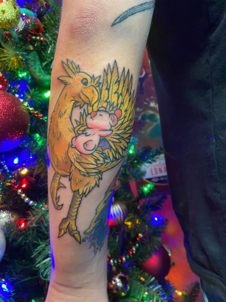 Chocobo and Moogle, done by Brit at Needlework Tattoo Co. in Sterling
