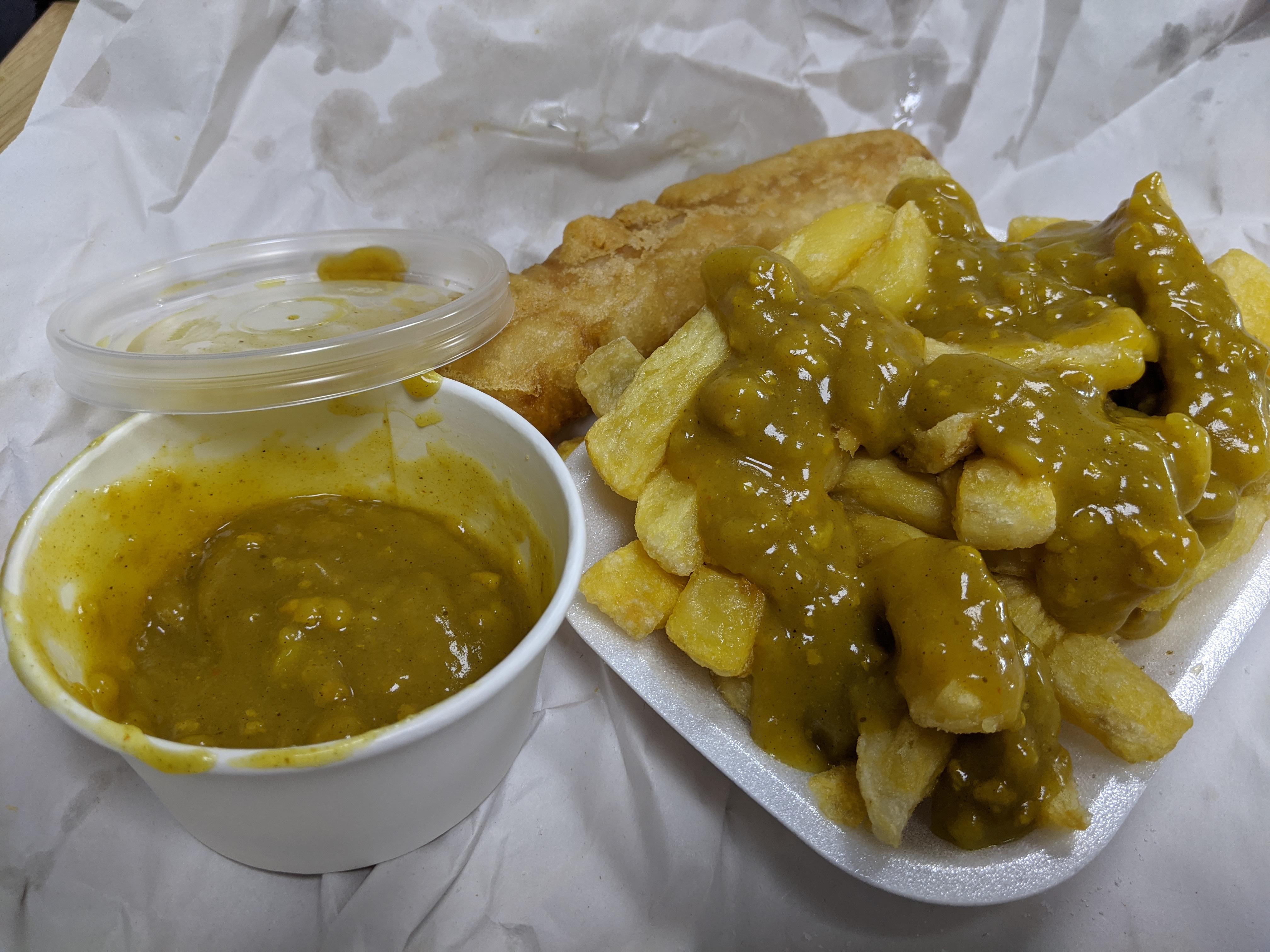 Chips, curry sauce and a jumbo battered sausage r/UK_Food