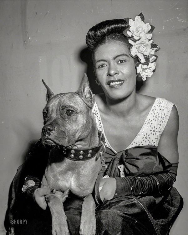 New York circa 1947. Billie Holiday and her dog Mister at a 52nd Street