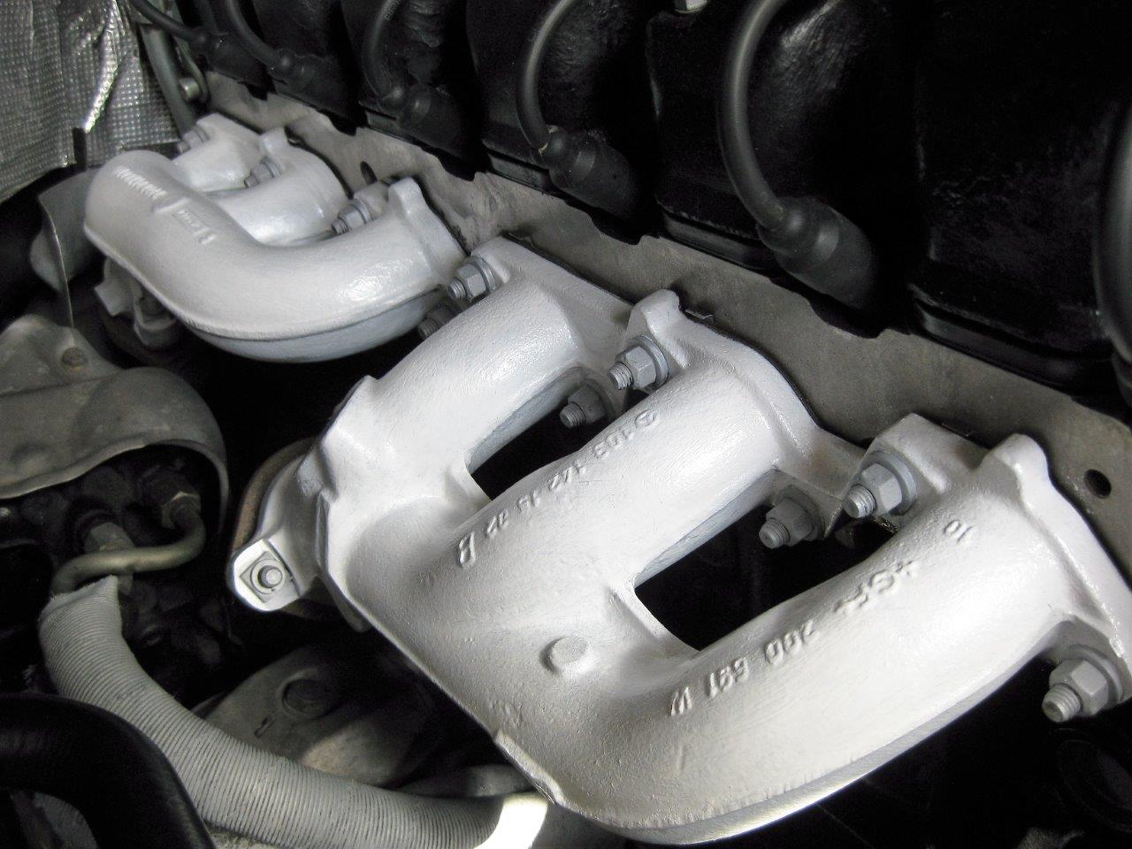 My 1988 300CE. Close up of hand painted exhaust manifold. r/mercedes_benz